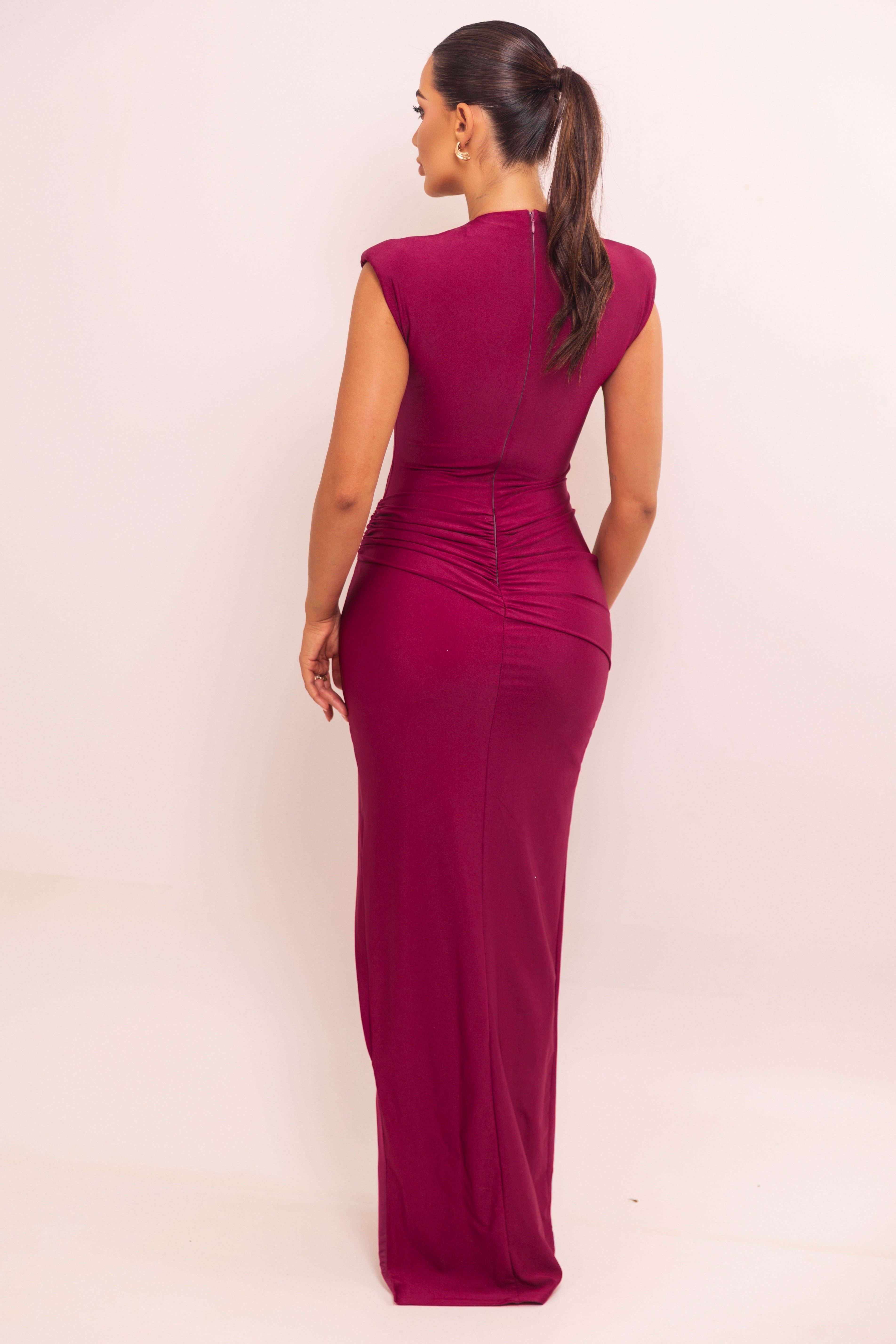 Elegant wine-colored dress with gold hardware