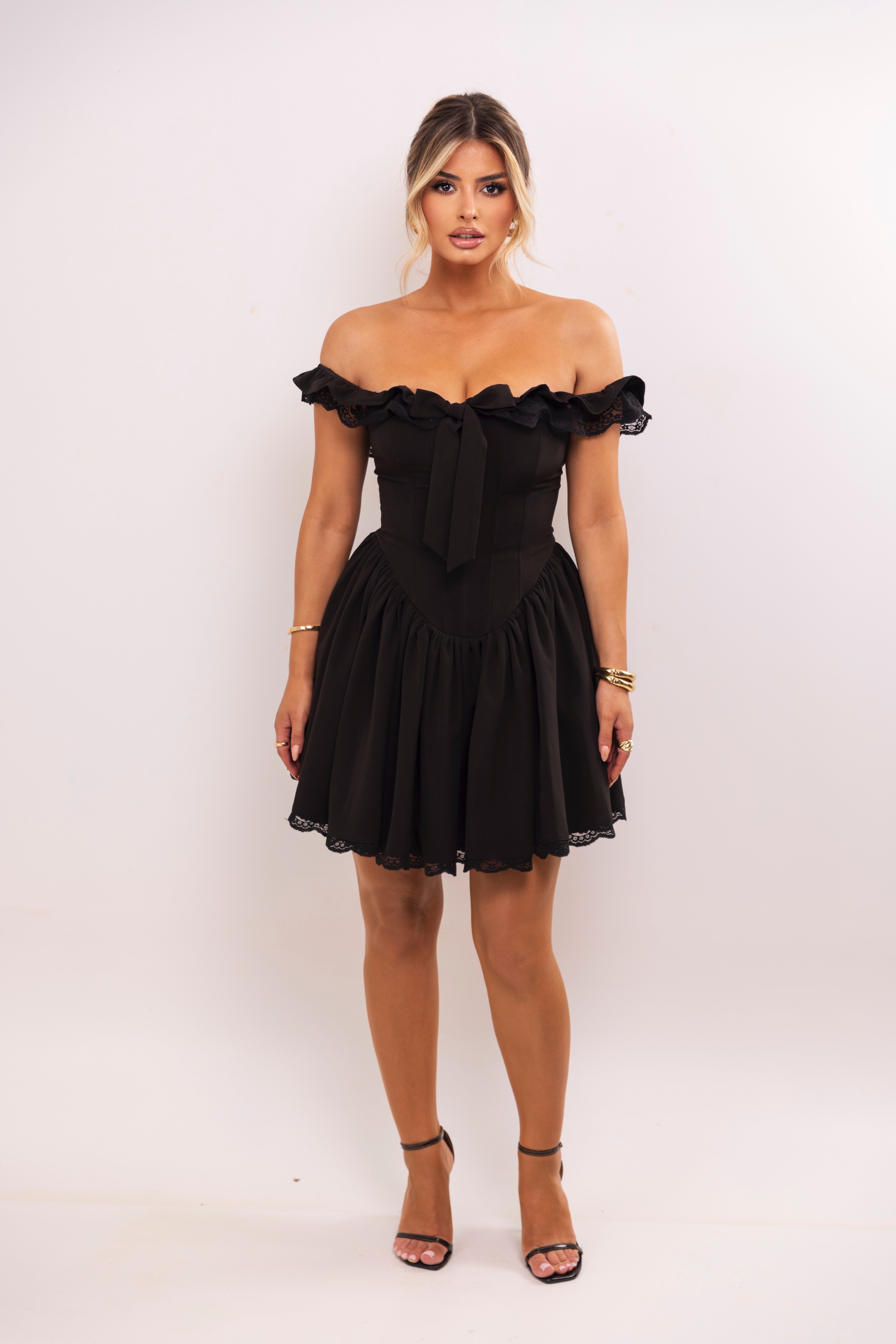 Backless black mini with sweetheart shape
