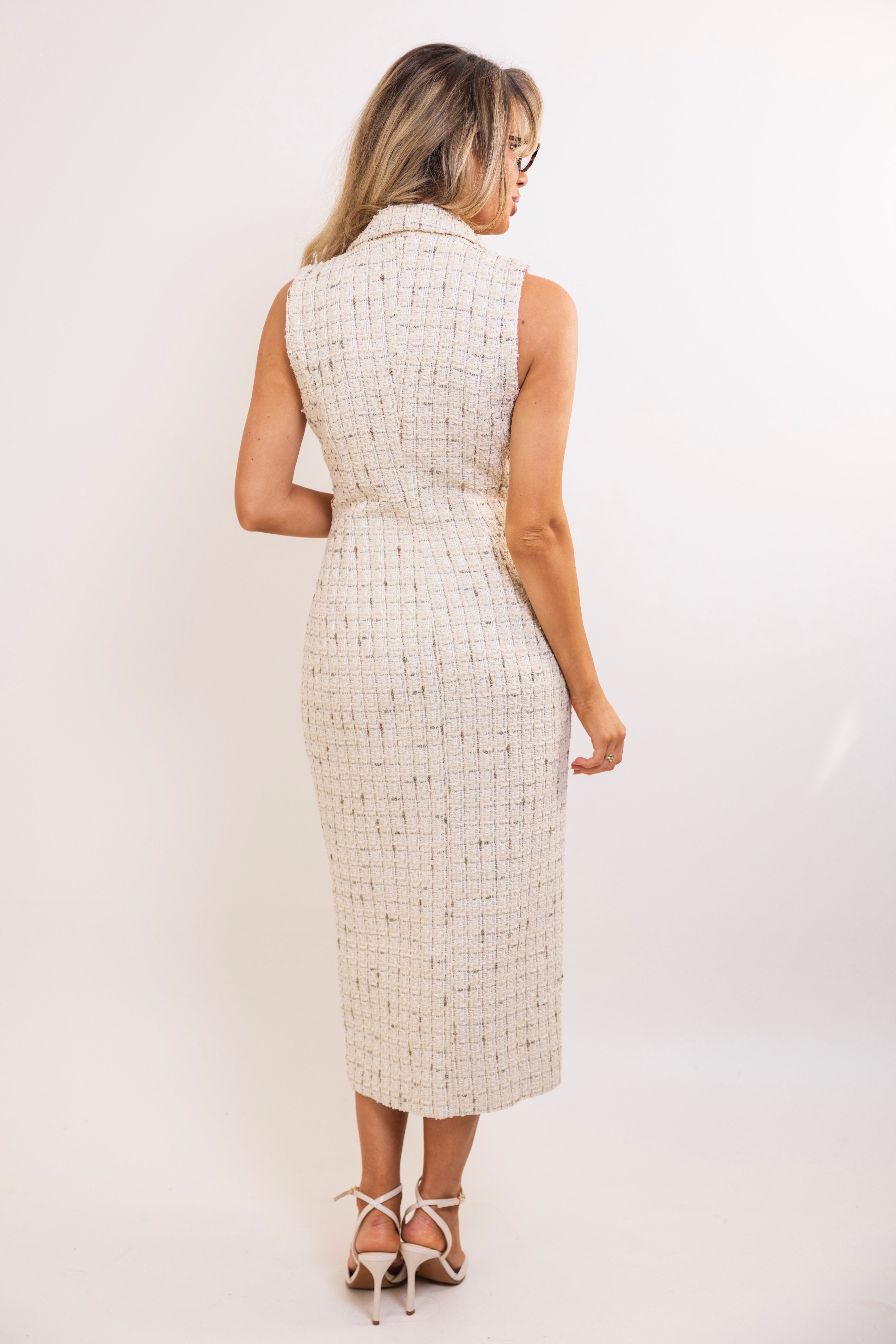 Elegant ivory tweed dress with structured silhouette and classic blazer-inspired detailing