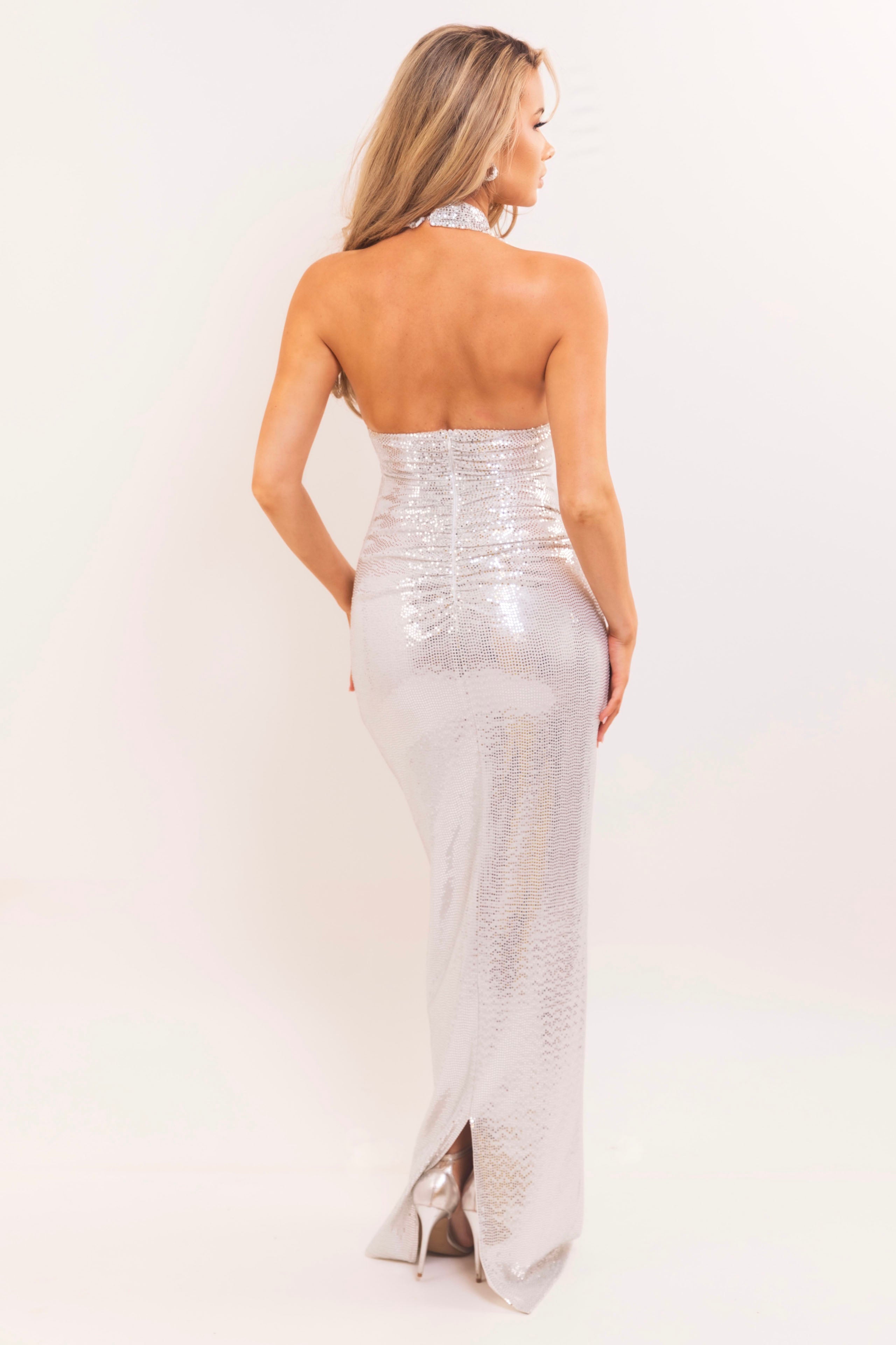 Elegant metallic evening dress with reflective texture and bodycon shape