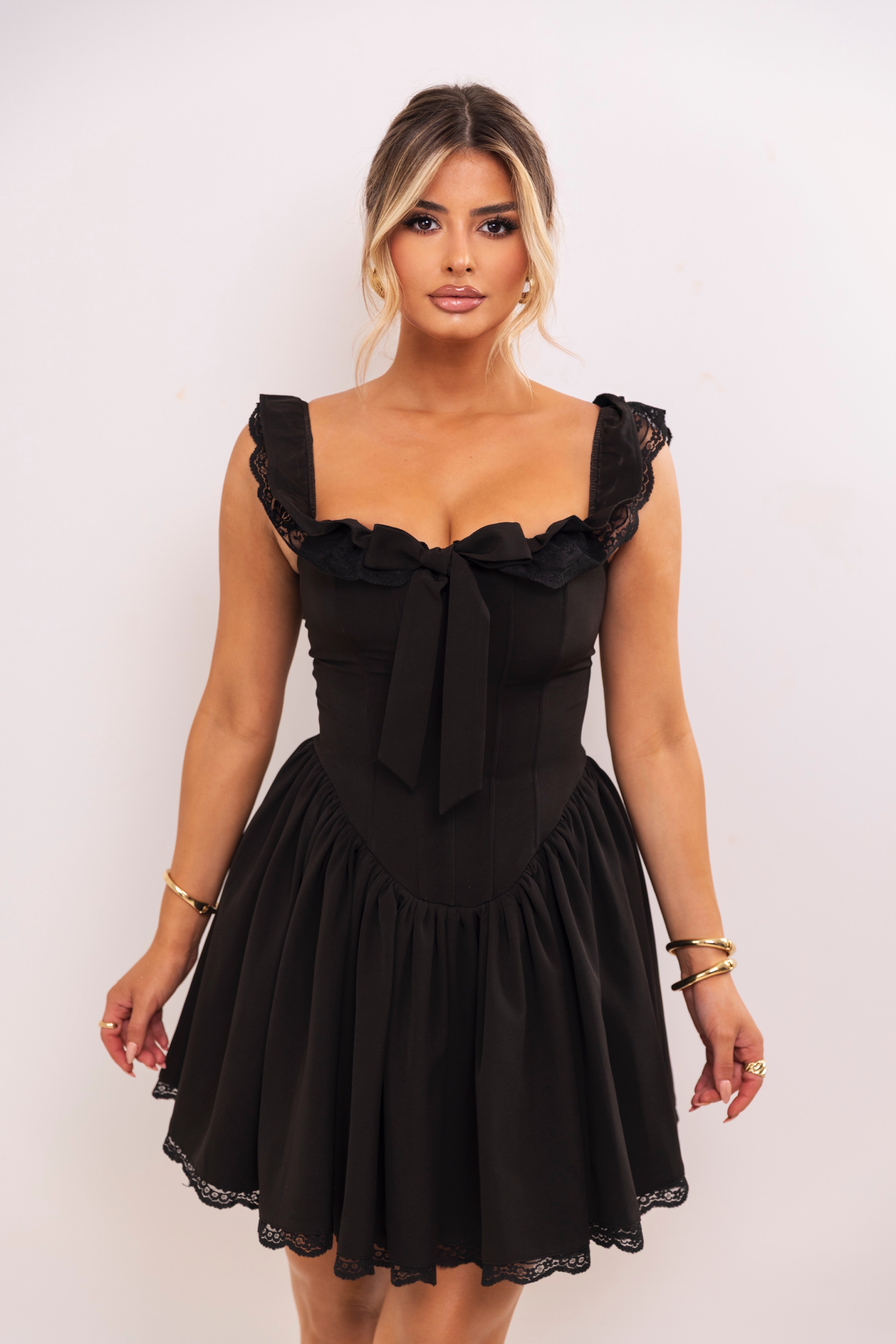 Romantic black dress with ruffled neckline