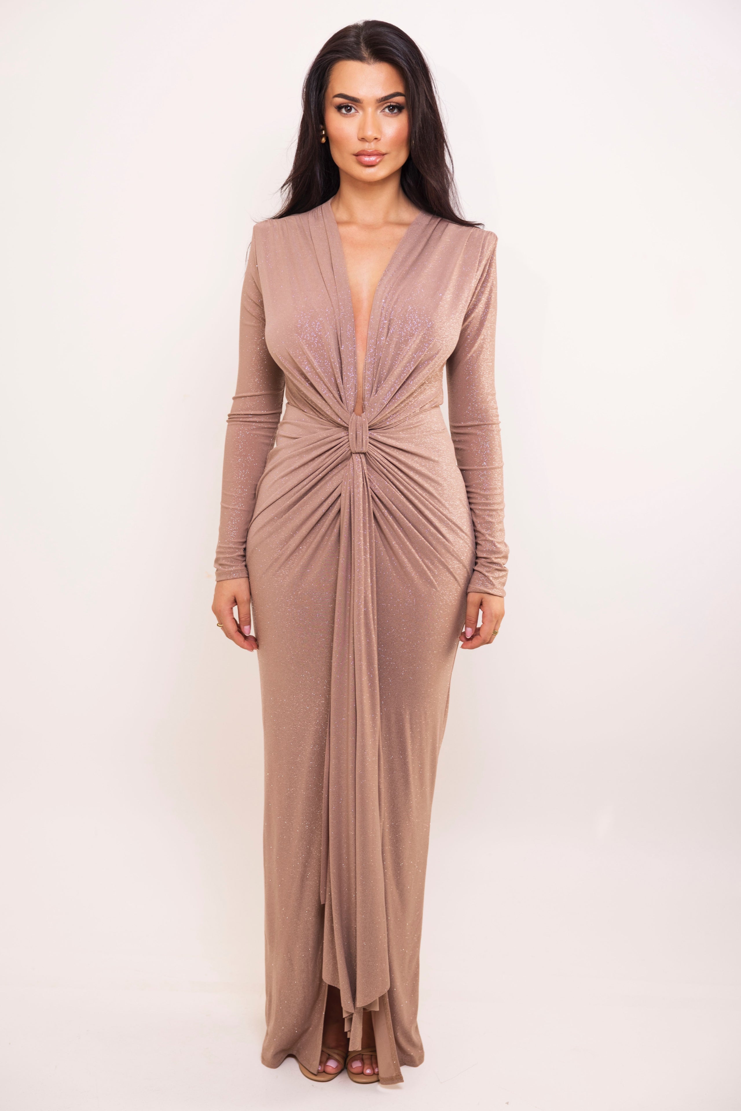 Mocha glitter gown with long sleeves and gathered knot detail at the waist.