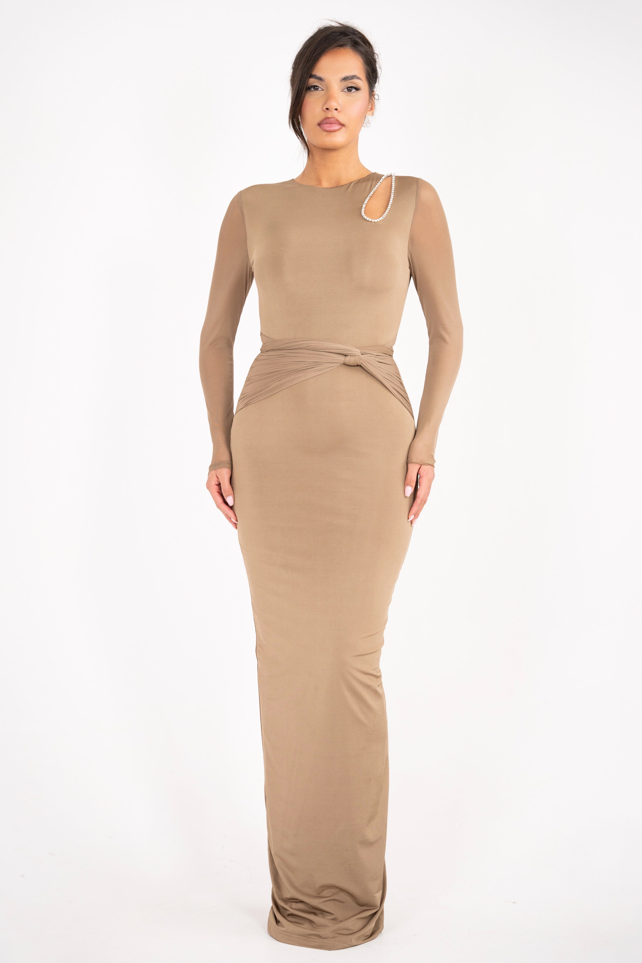Model wearing the Lusianna dress with a rhinestone chest opening and mesh arms