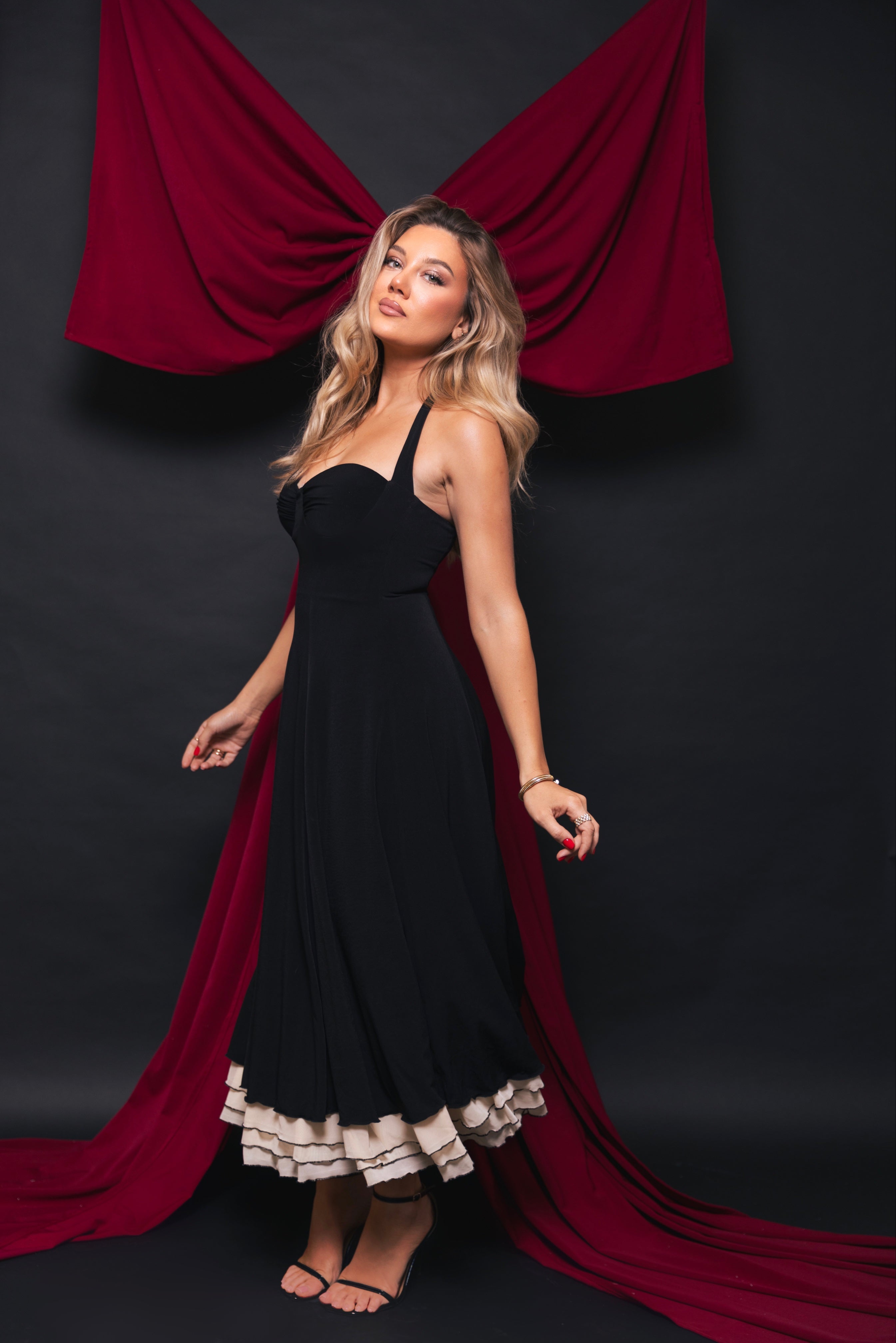 The soft fabric drapes beautifully, making it an ideal choice for both festive and formal occasions