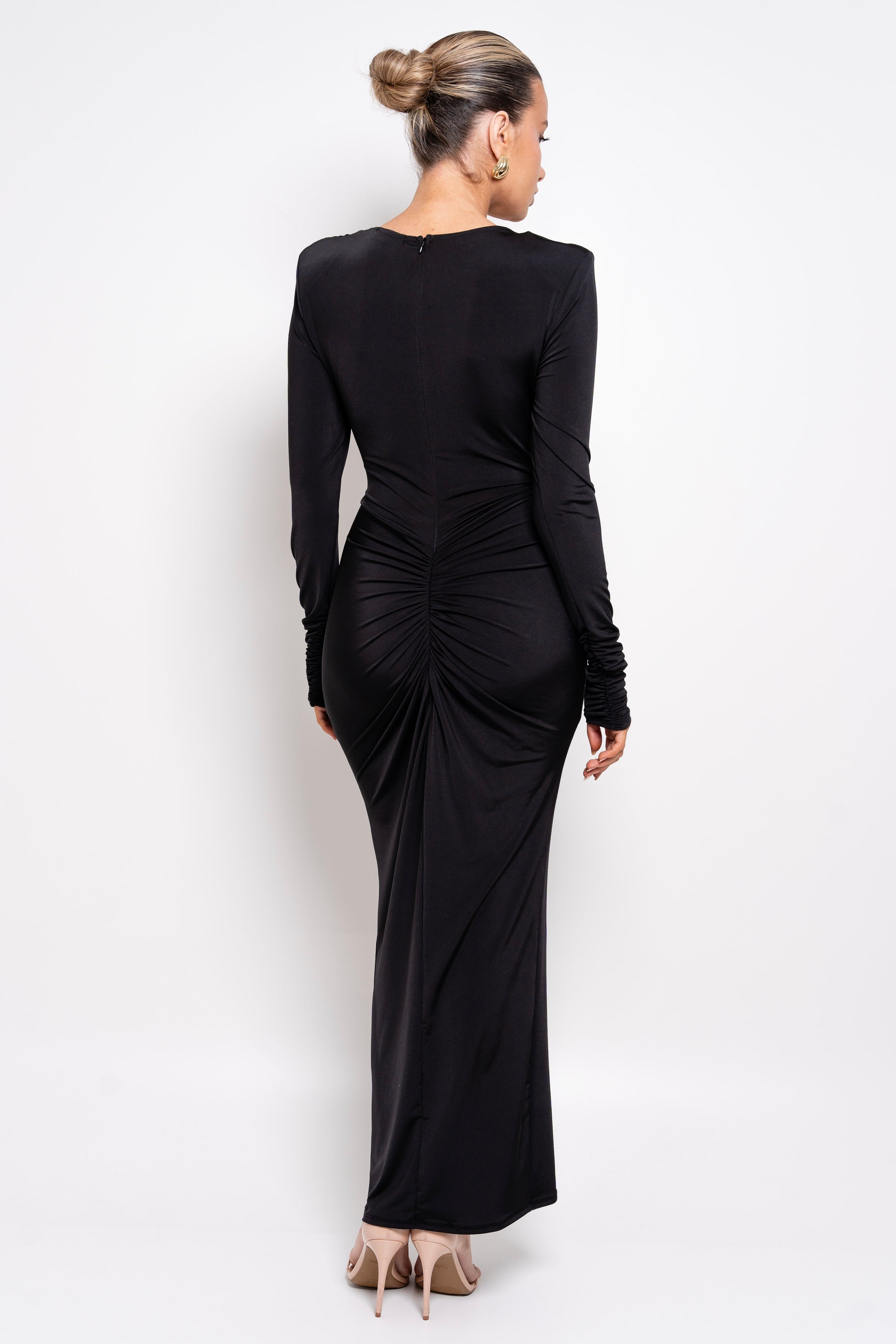 Sophisticated black one-shoulder dress with a flattering twisted waist.