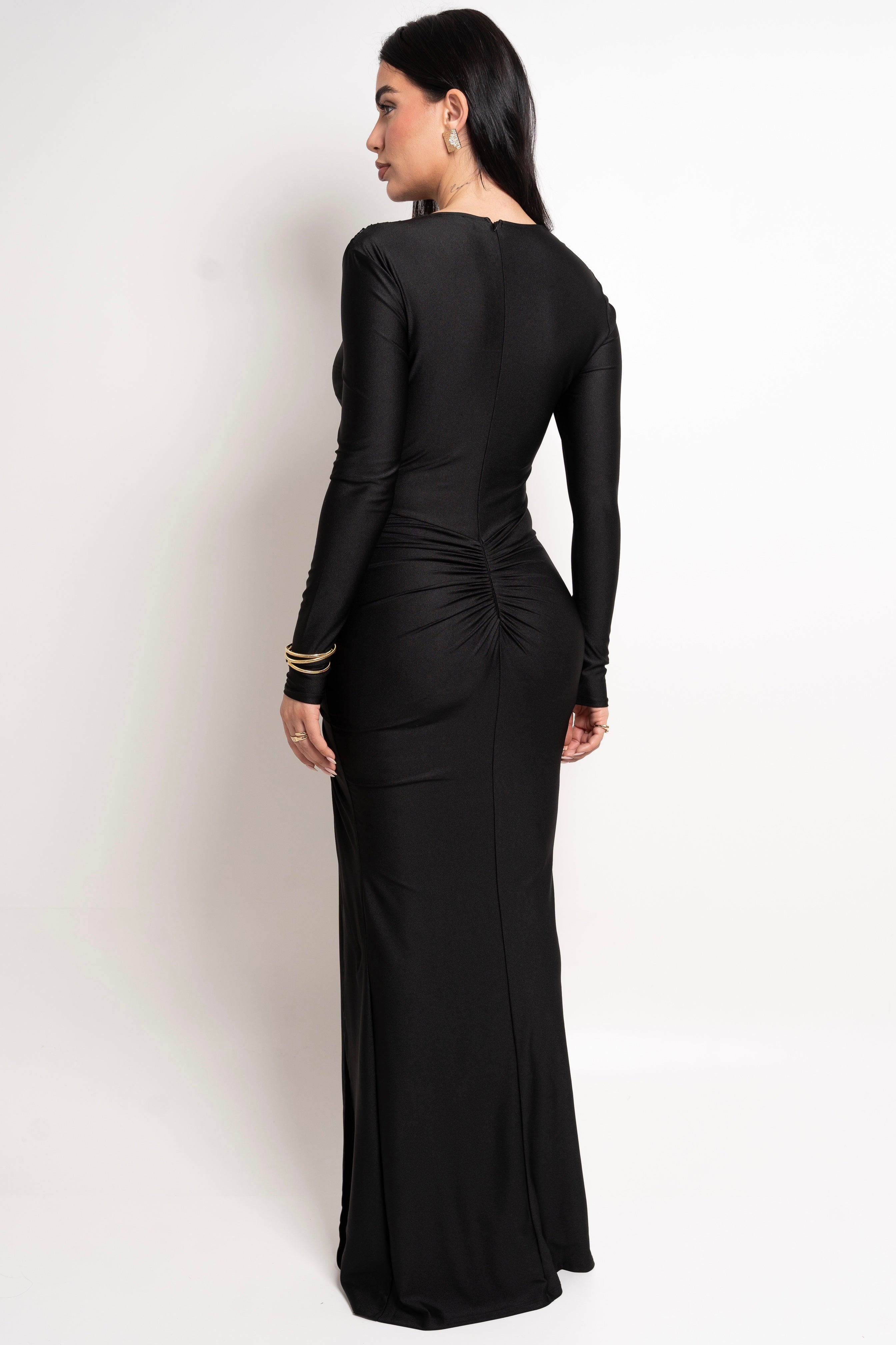 Refined black evening dress with striking front gathers and a graceful fit.