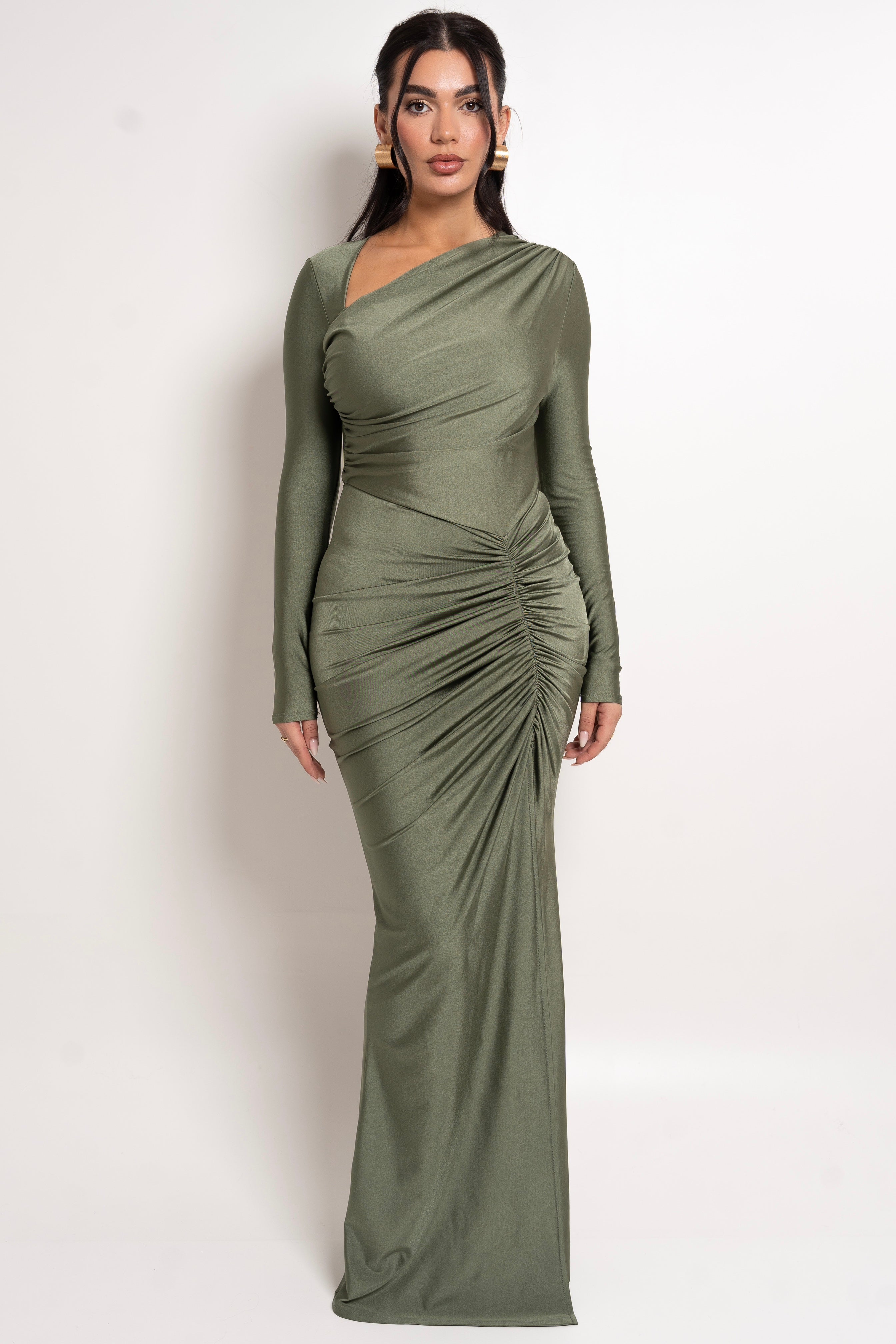 Long-sleeve olive green maxi dress with a high slit and gathered side details.