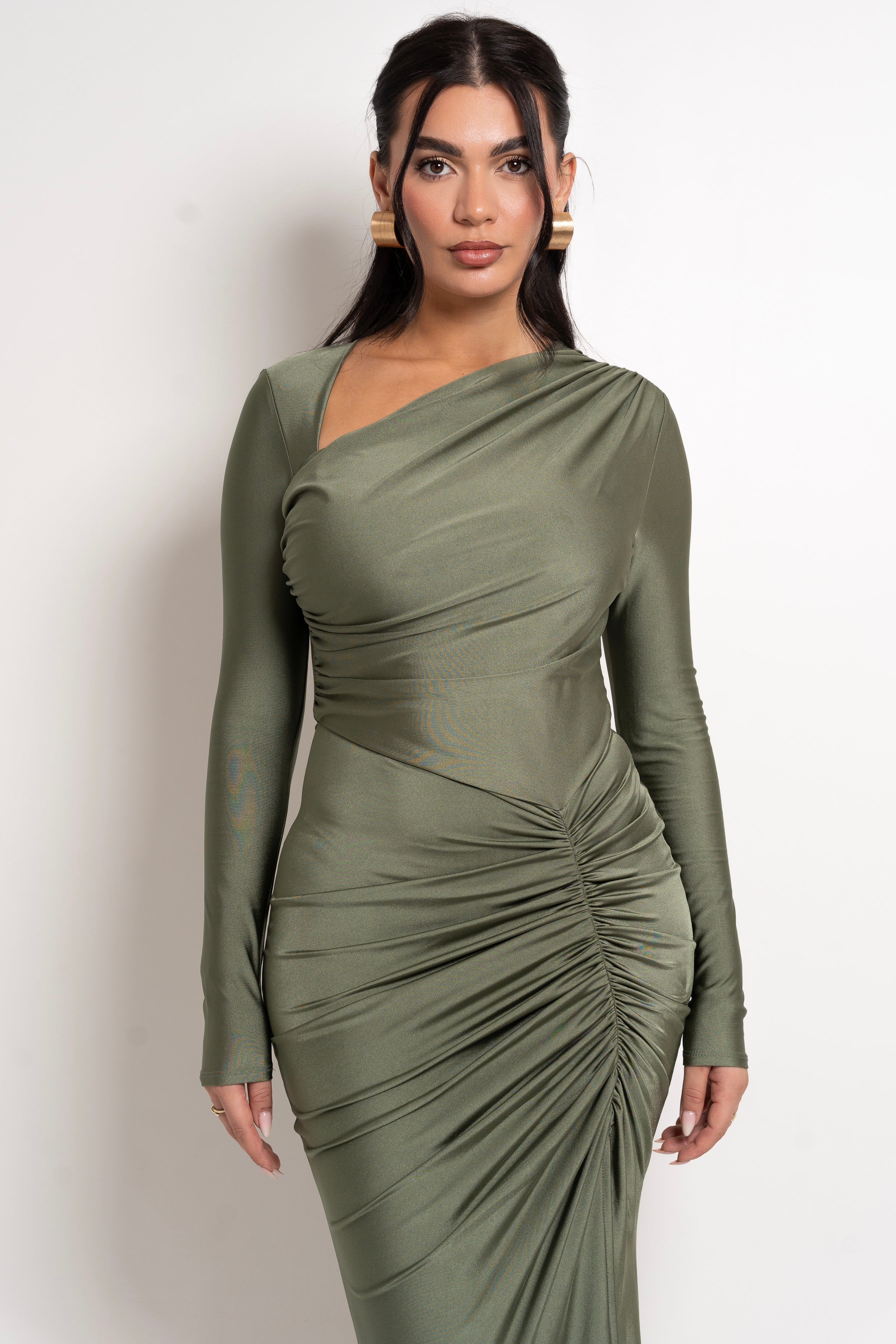 Sleek, bodycon olive maxi dress with a statement ruched panel and slit.