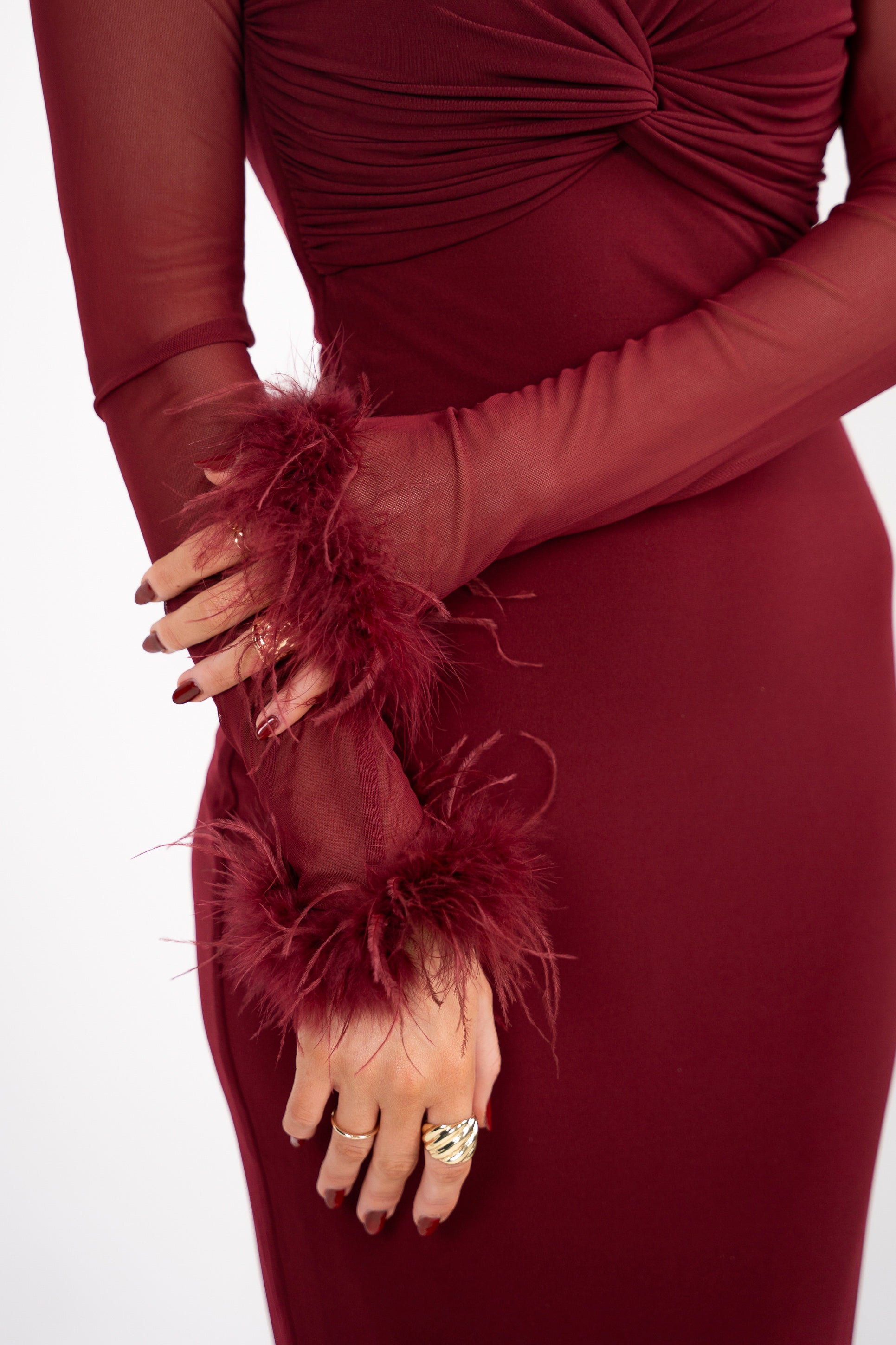 Fitted maroon gown with ruched bust detail and mermaid hem