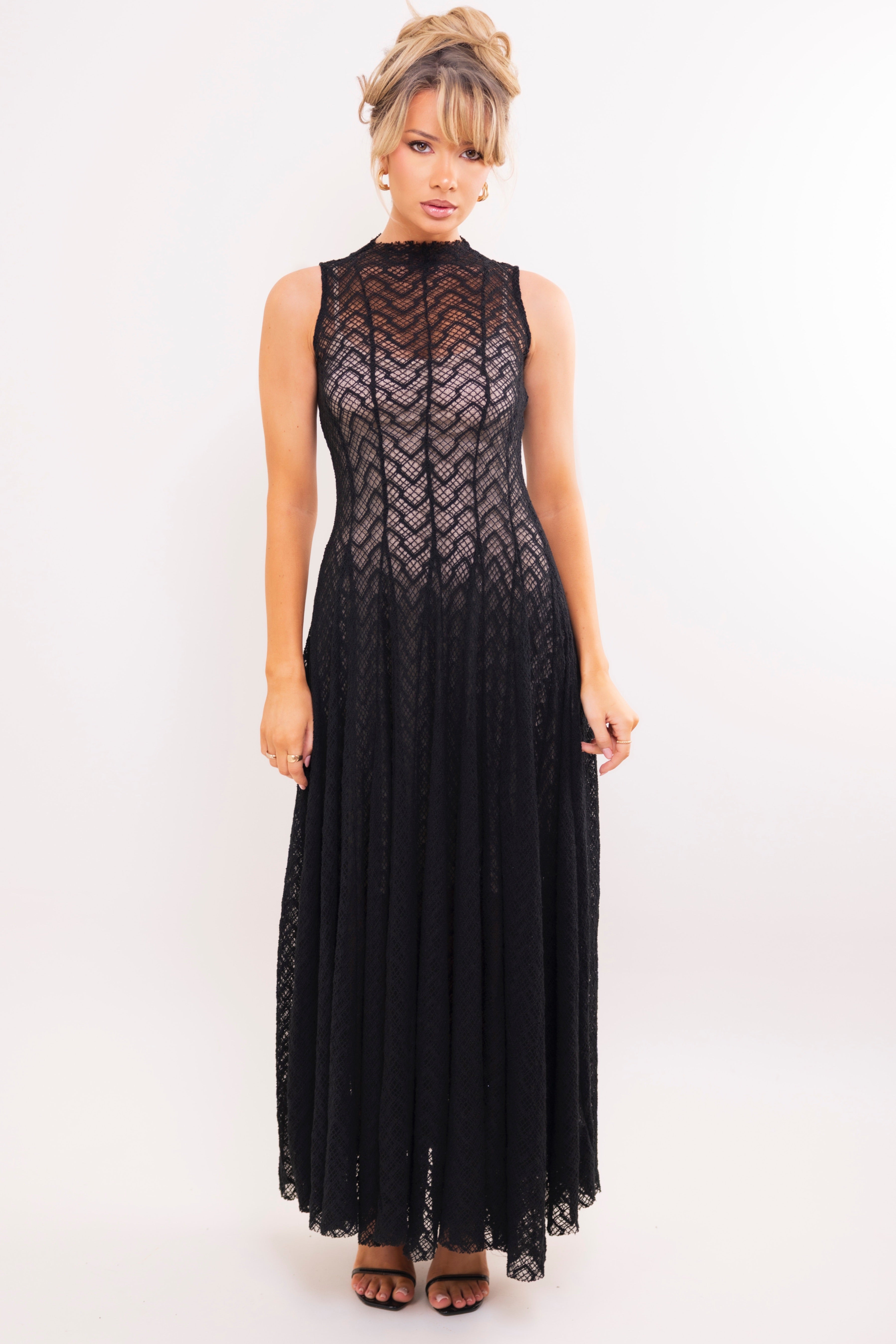 Romantic black lace evening dress with see-through yoke and full-length skirt