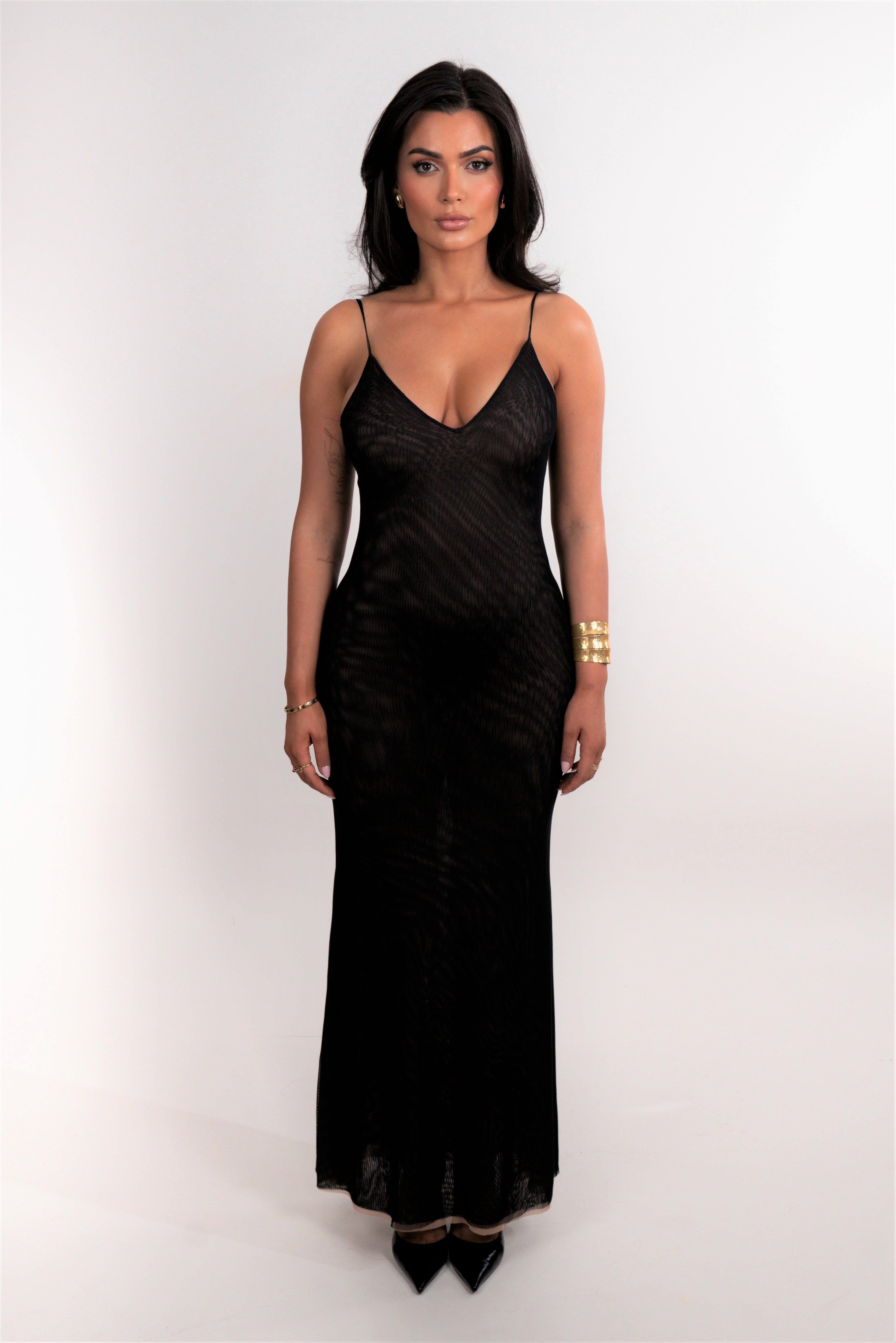 Black mesh gown with embroidered floral pattern