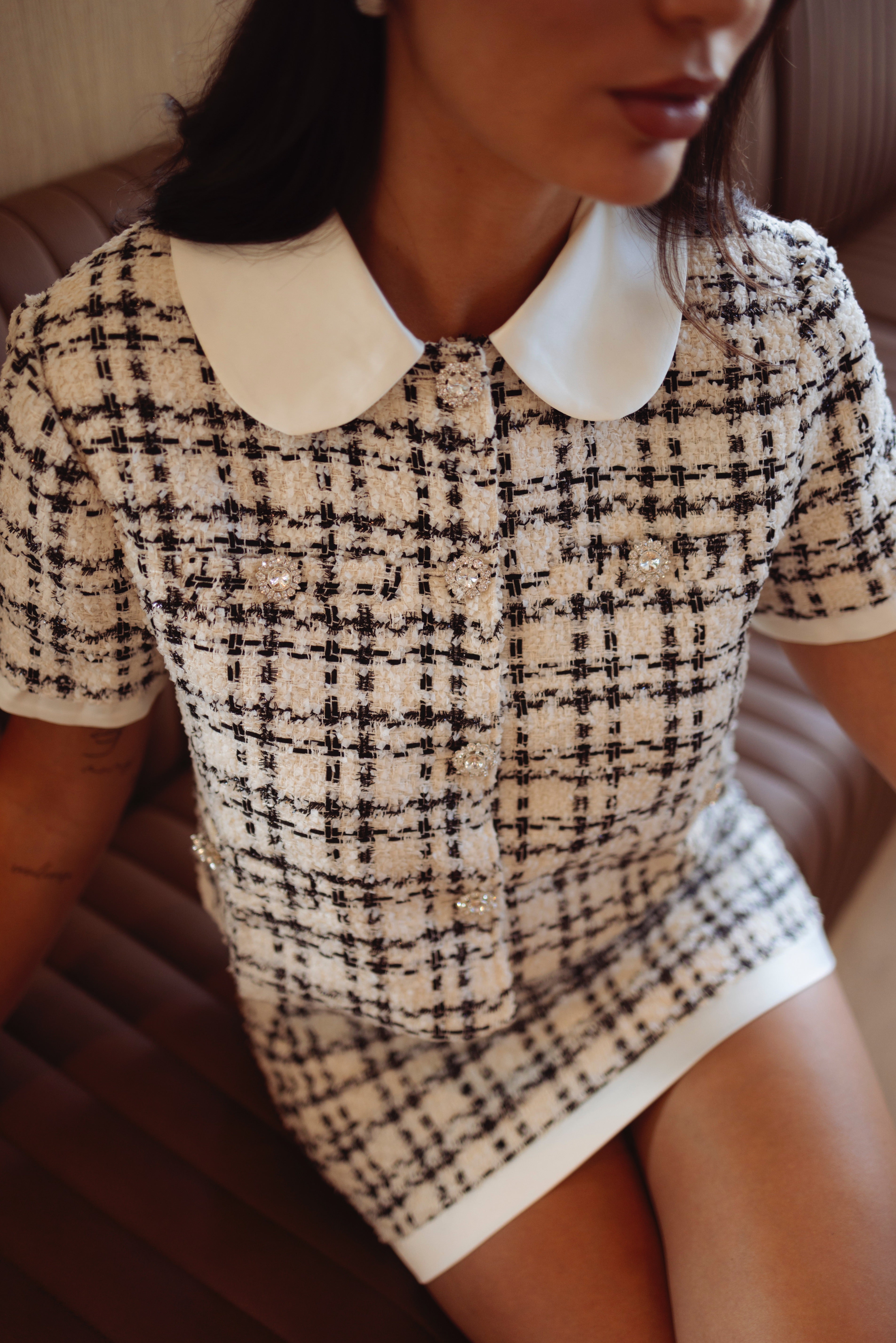 Elegant collared cream set styled for evening wear