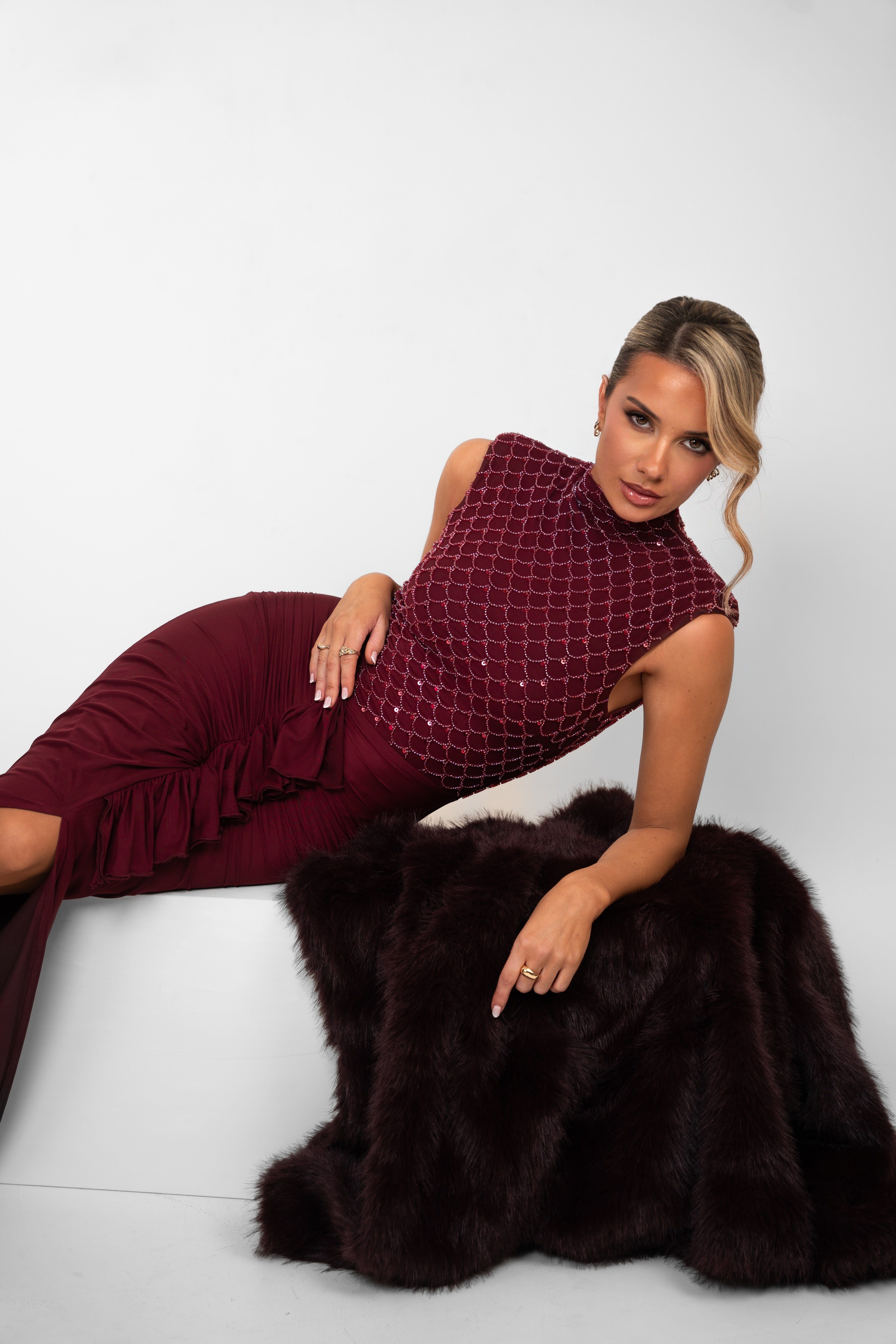 "Rich burgundy dress with high collar