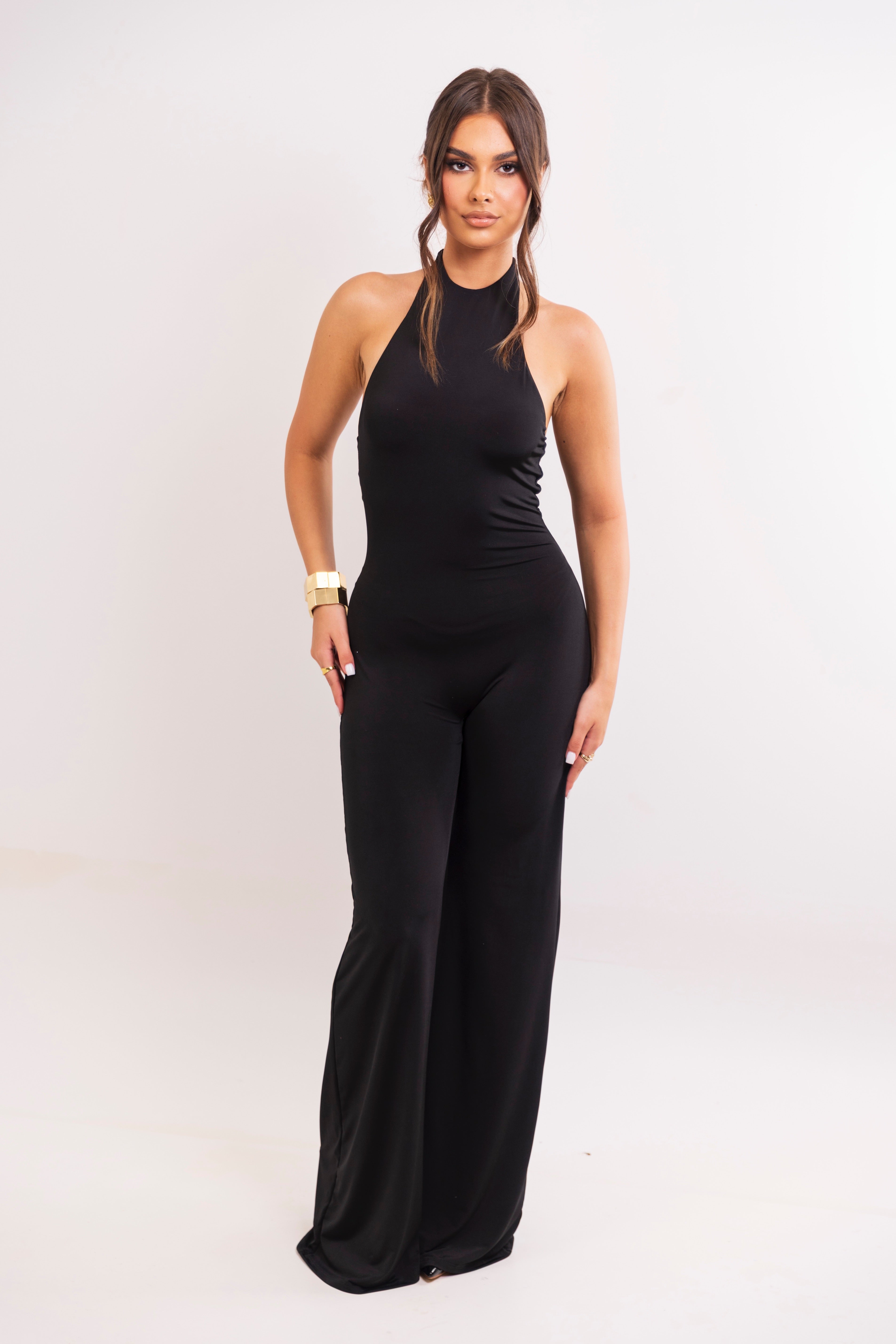 Sleek black halter jumpsuit with wide legs