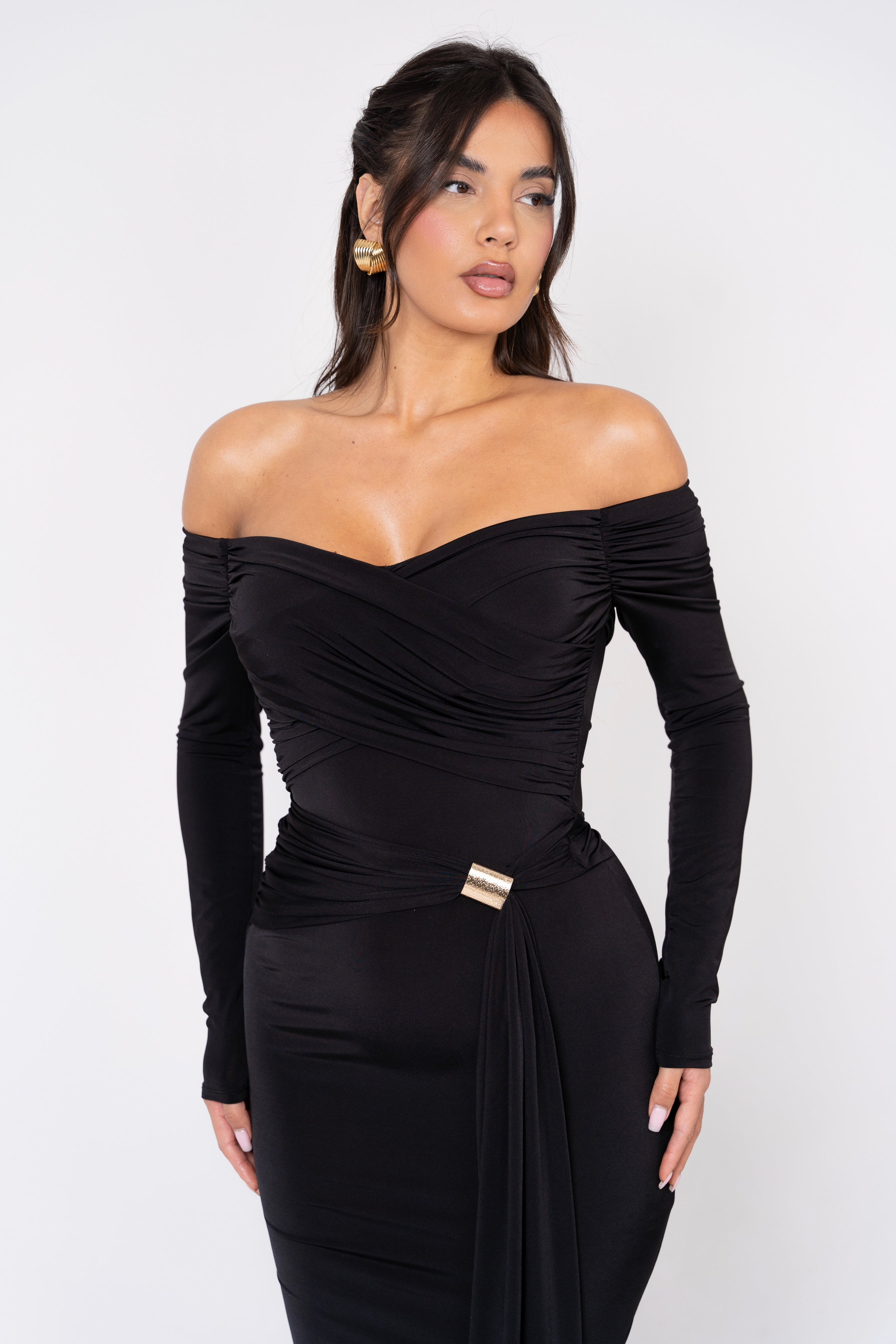 Stylish black gown with an asymmetrical drape and fitted design