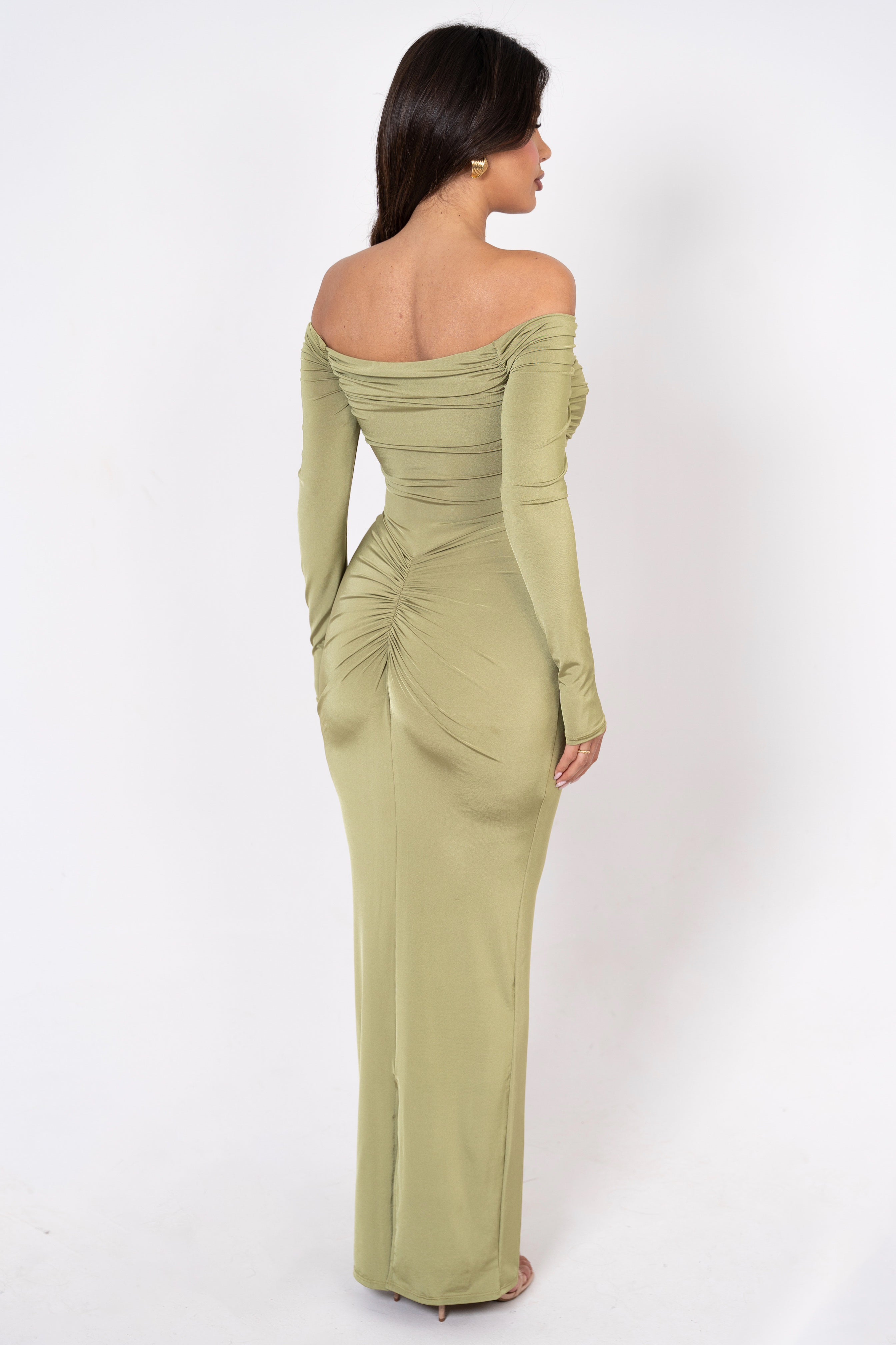 Tailored watergrass gown with a statement gold buckle