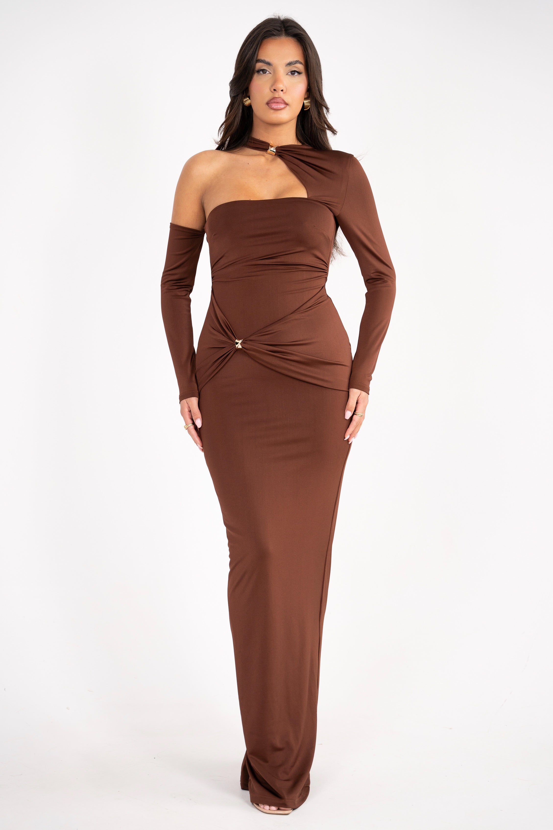 Chic chocolate evening dress featuring a high neckline and a sophisticated off-shoulder sleeve.