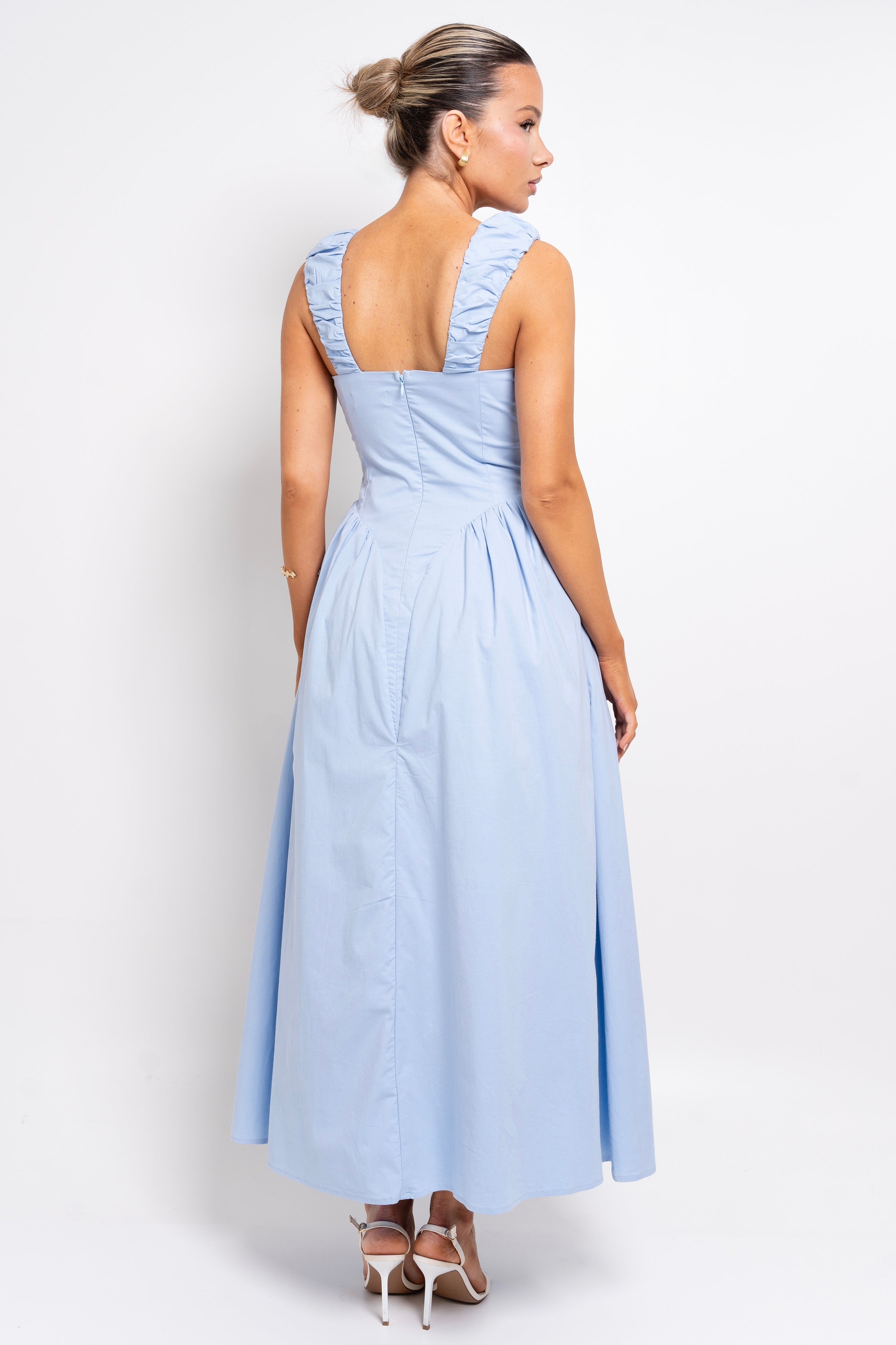 Sleeveless ruched maxi dress in pastel blue.