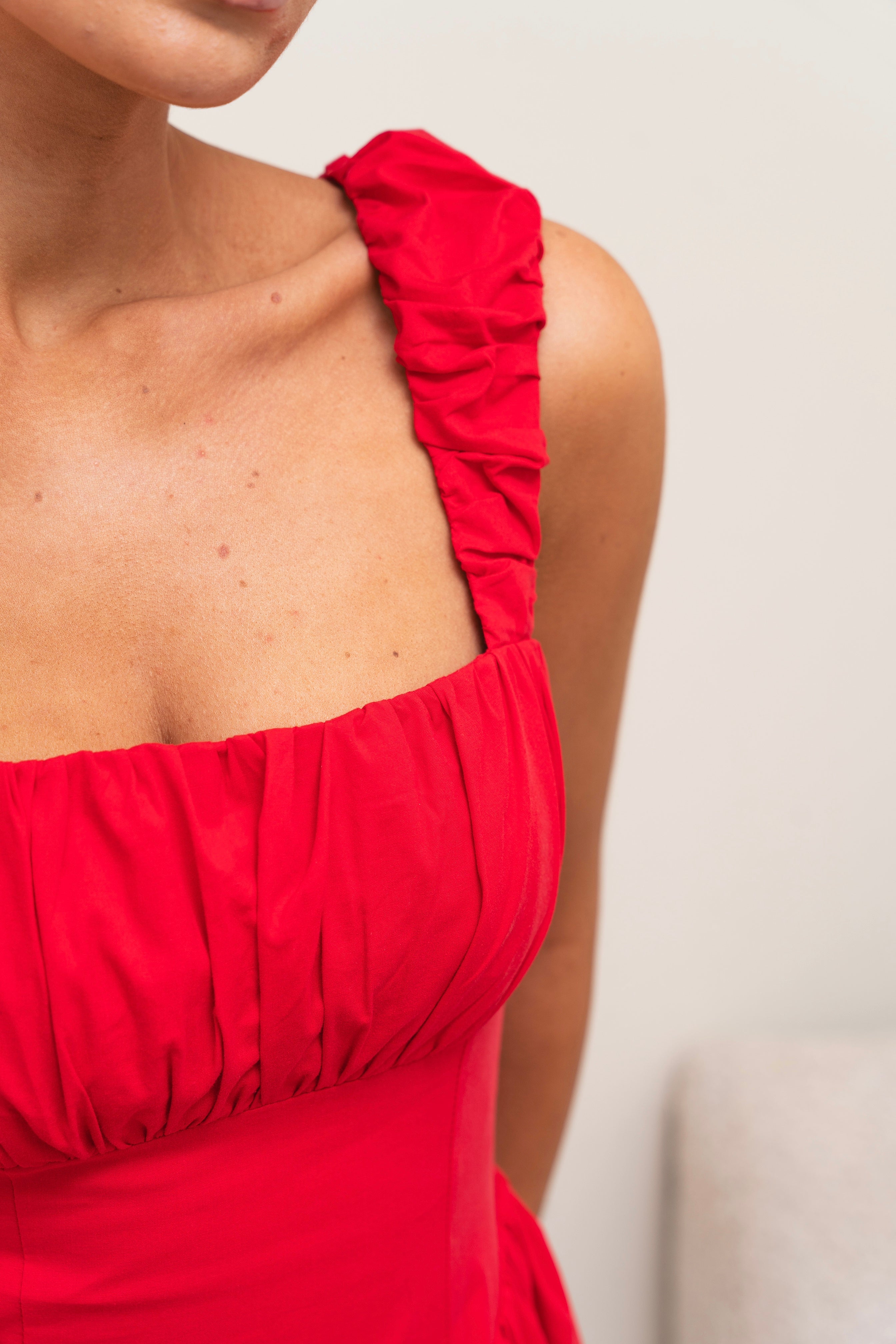 Flowing A-line dress in bold red.