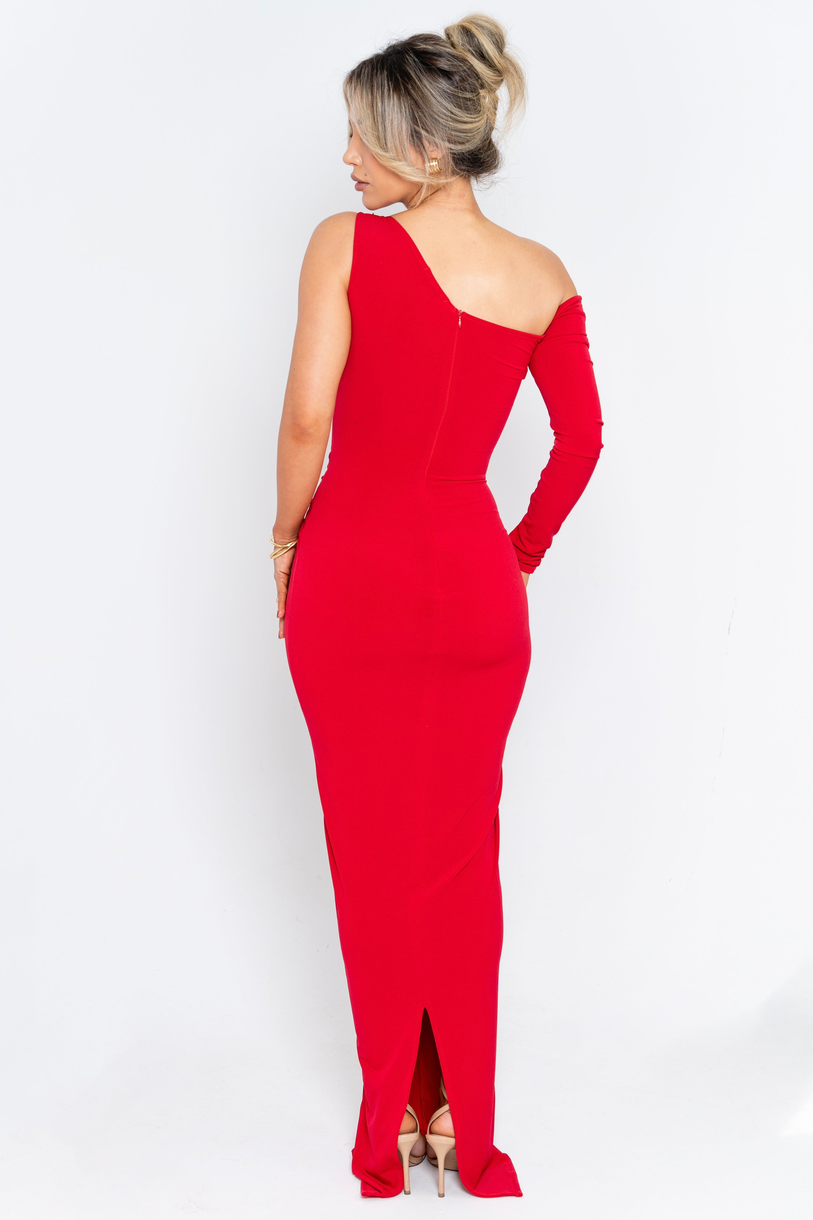 Sleek red maxi dress with an asymmetrical neckline and a draped waist, perfect for special occasions.