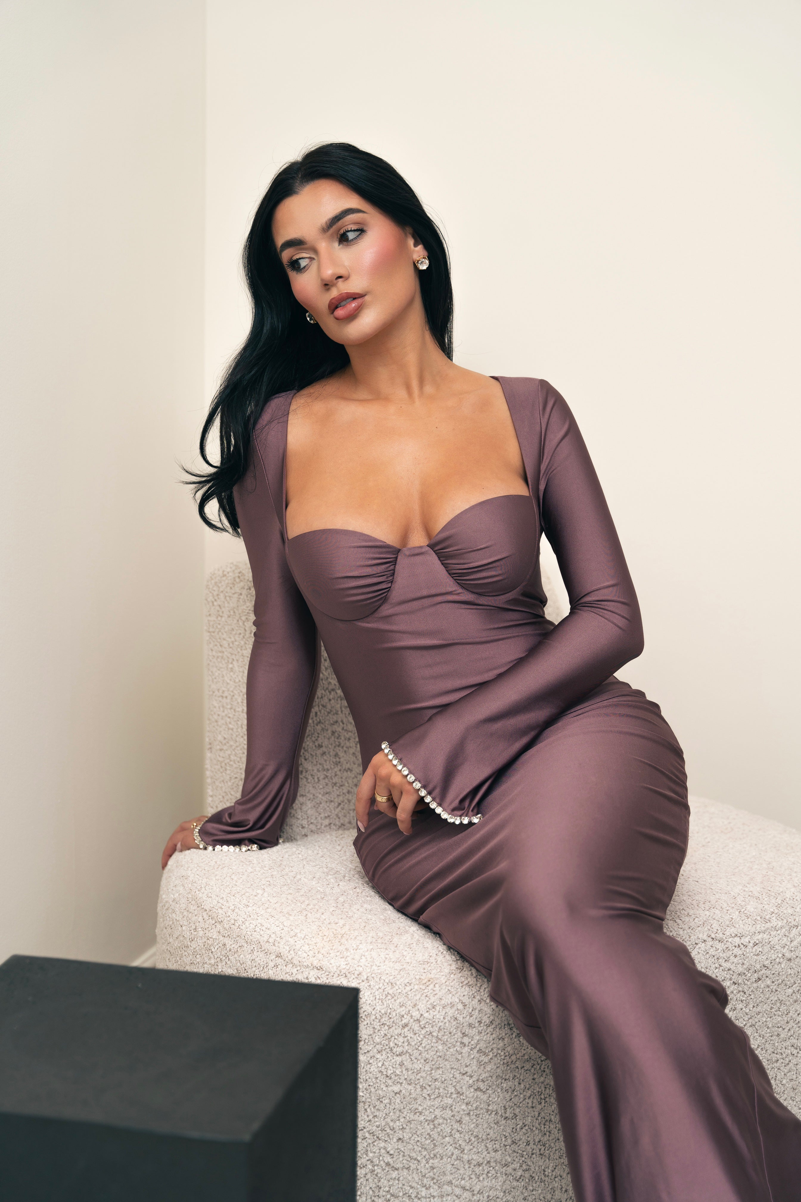 Elegant floor-length mauve gown with a corset-inspired top and minimalist detailing.