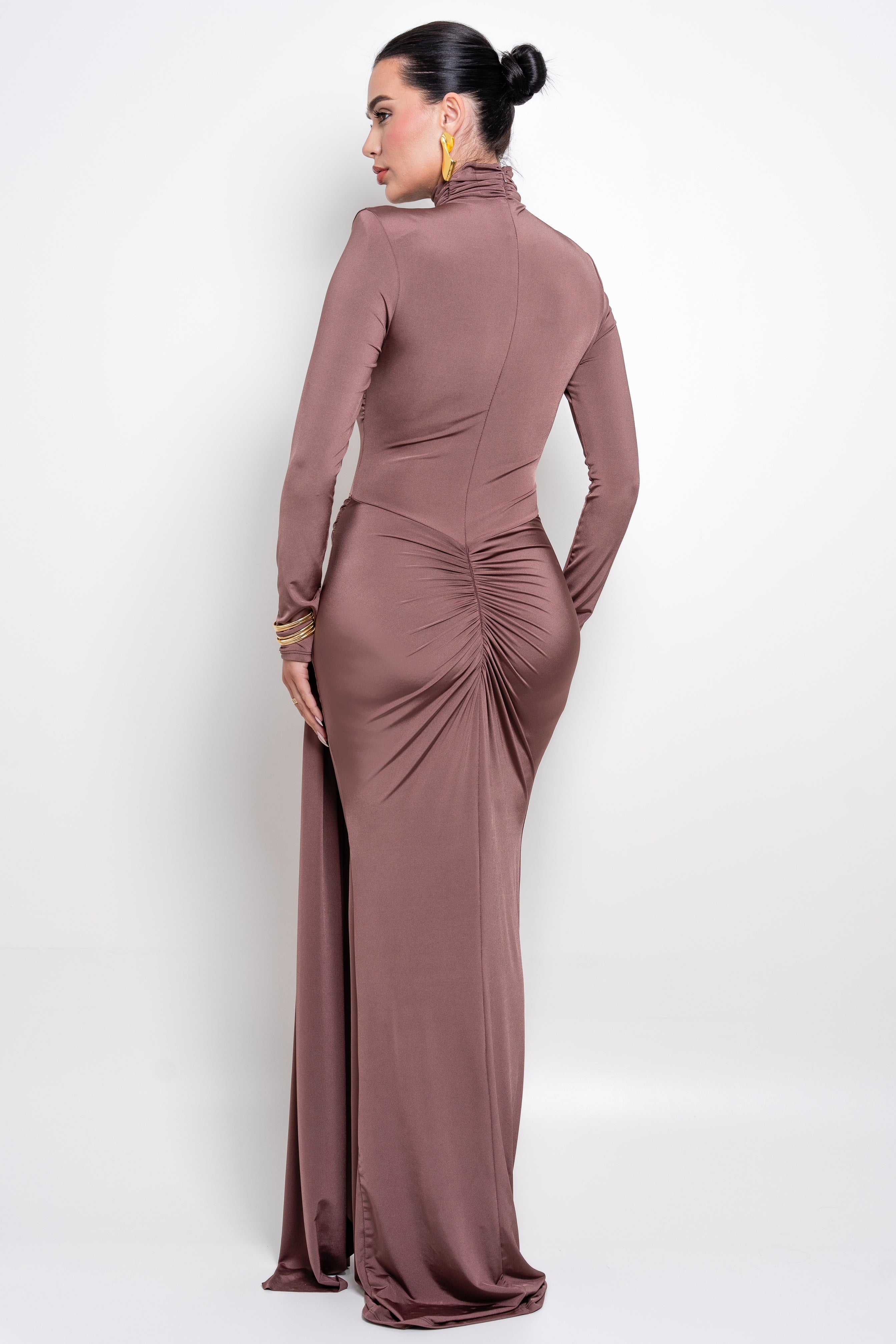 Chic caffe evening gown with a structured design and graceful flowing elements.