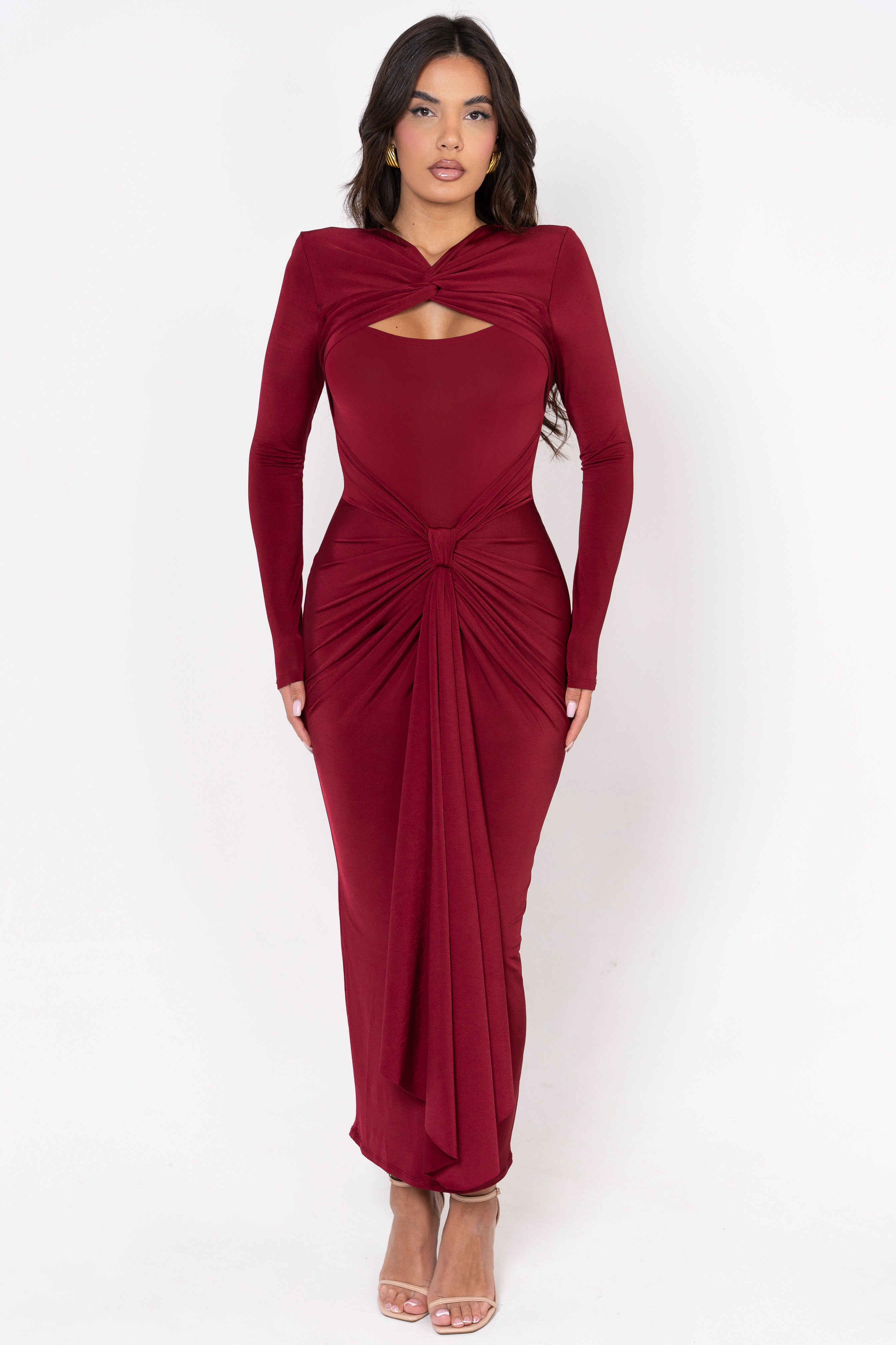 Timeless burgundy dress with tailored long sleeves and bold details