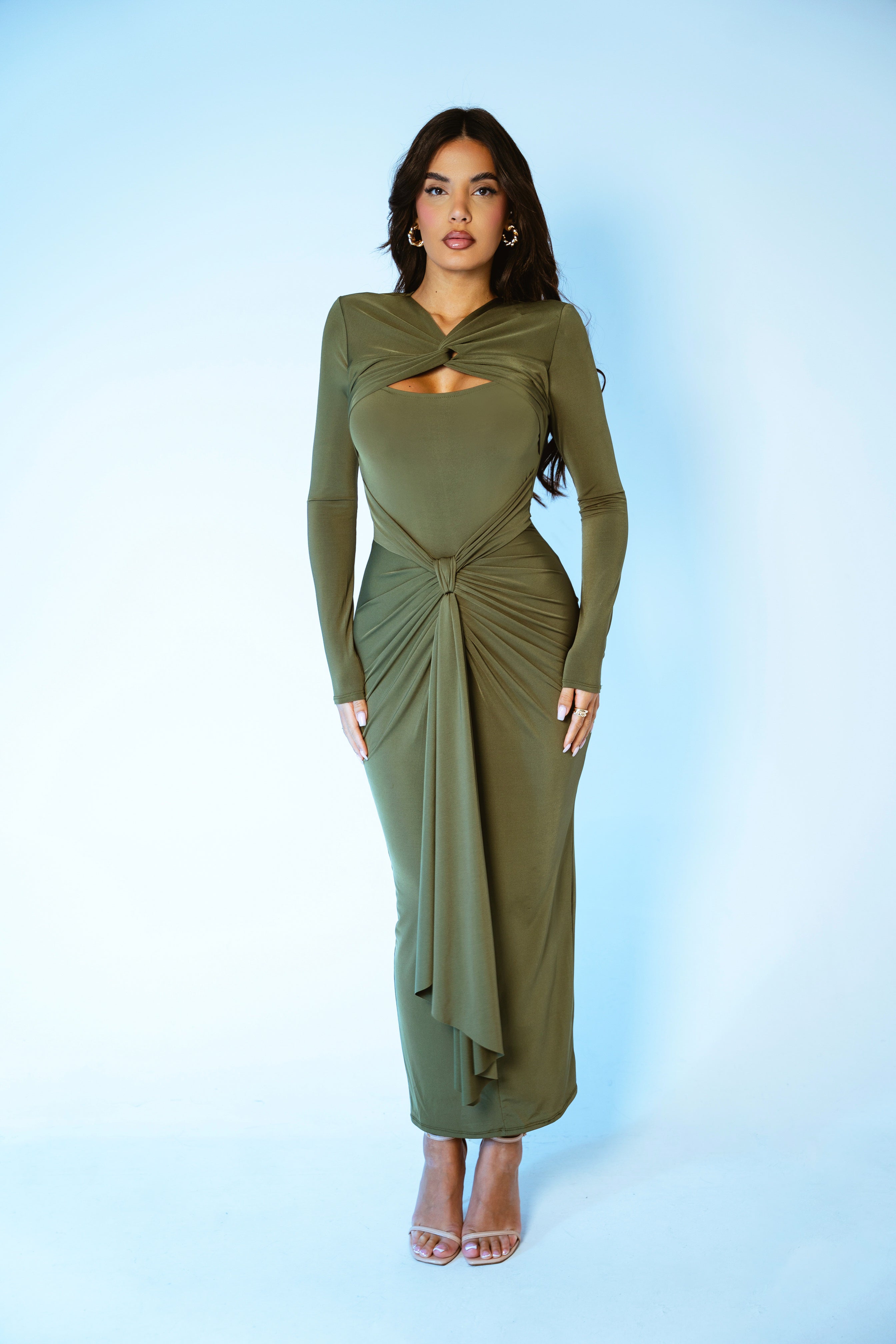 Contemporary green gown with intricate ruched accents