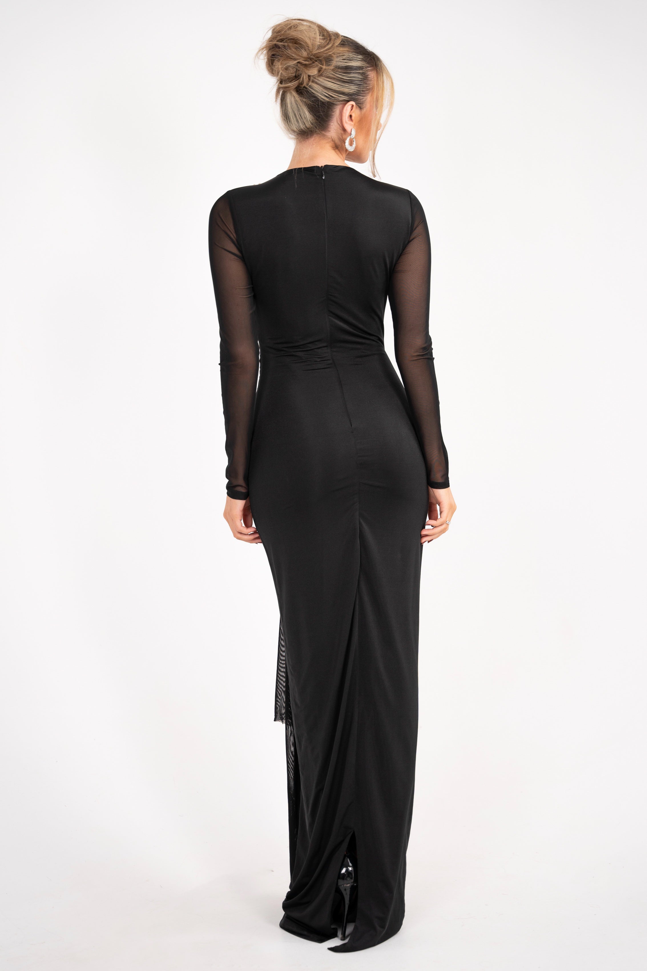 Full-length view of the Lusianna dress with mesh arms and a sleek design