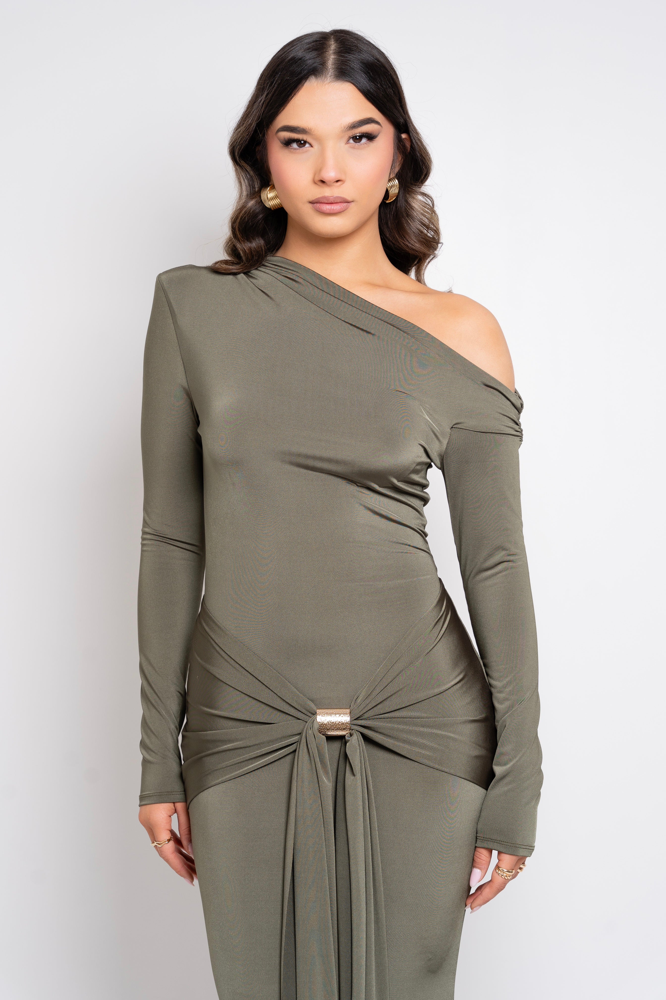 Chic olive dress featuring a one-shoulder design and waist accent.