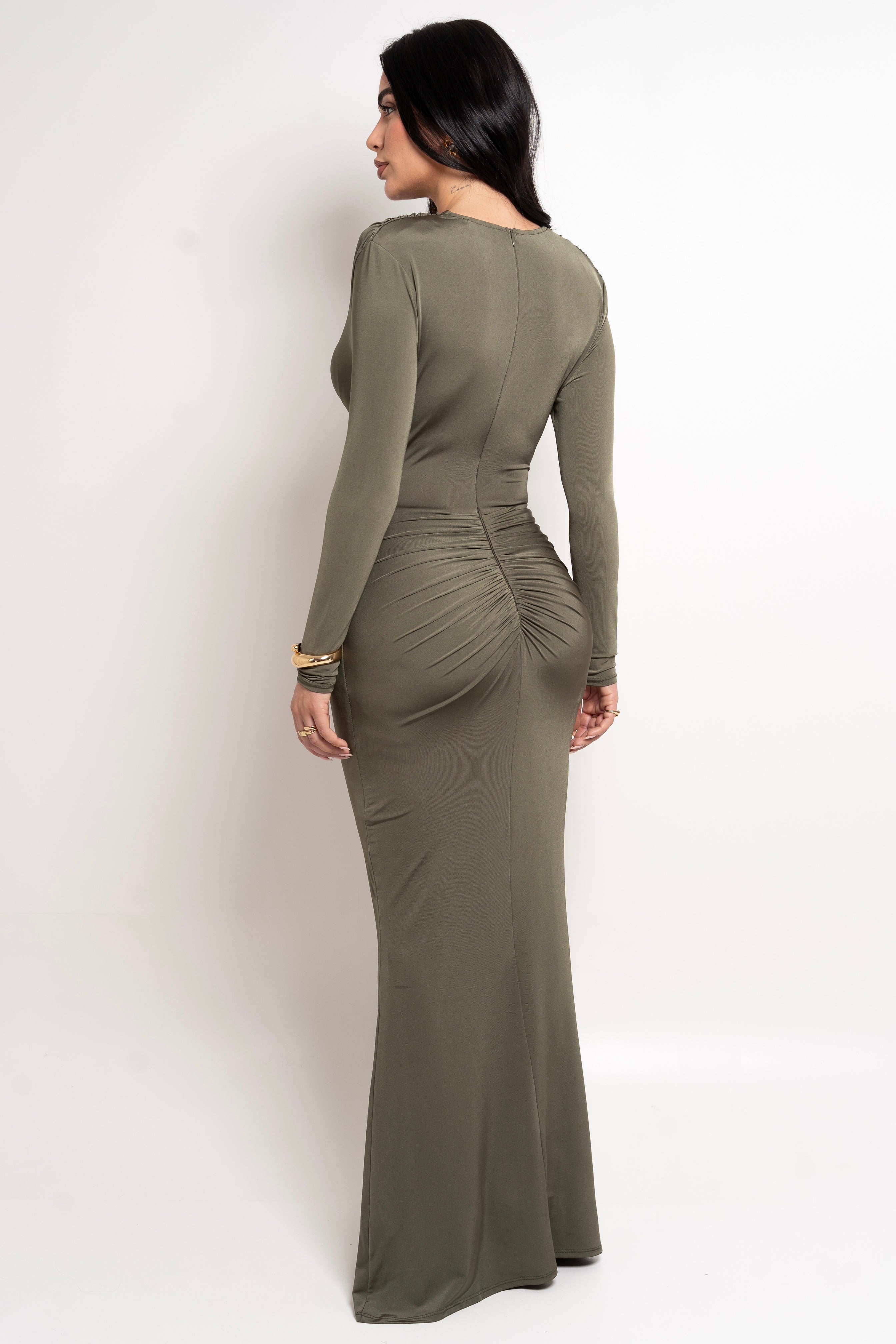 Long-sleeve olive gown with front knot design.