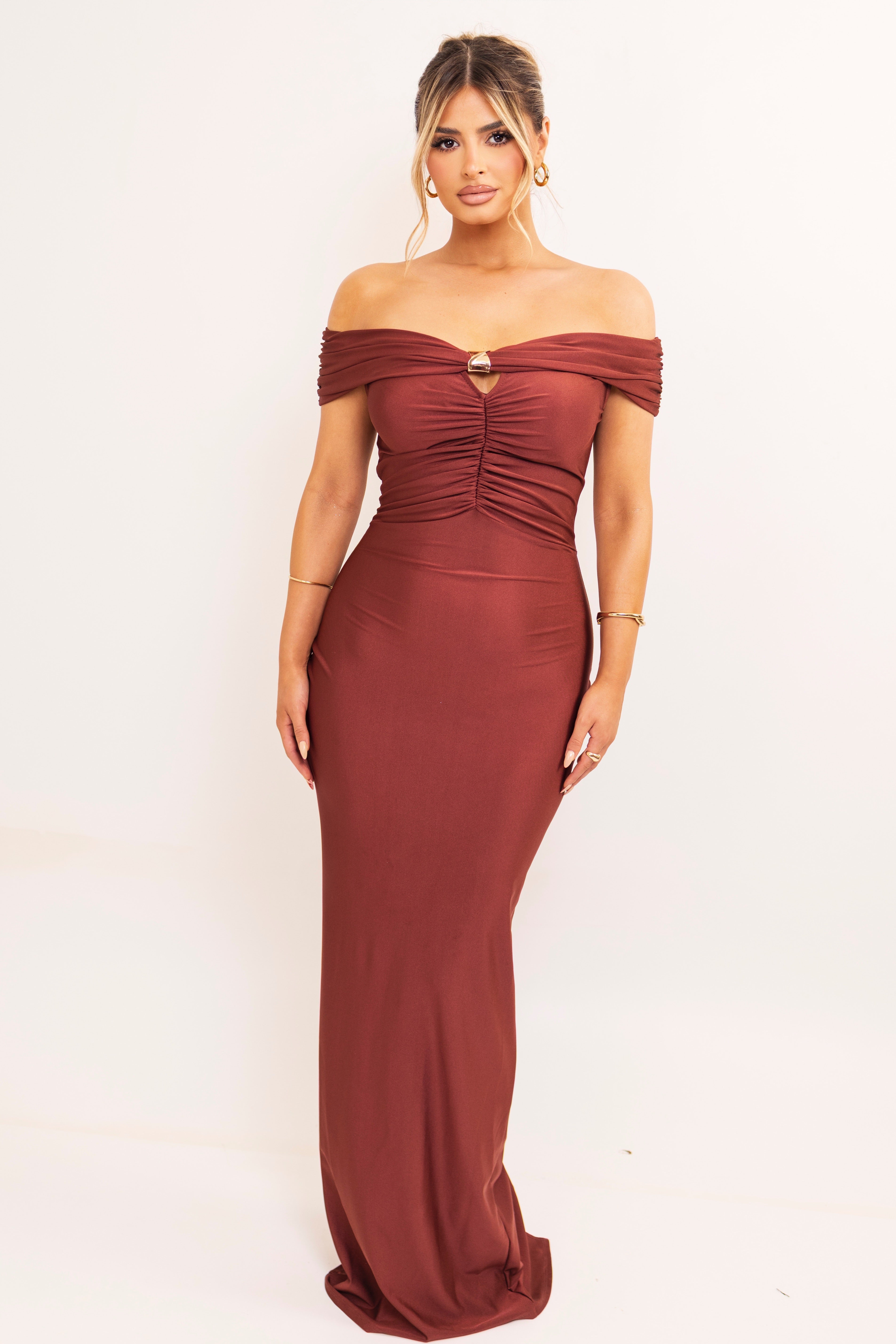 Full-length gown with back ruching and soft draped neckline.