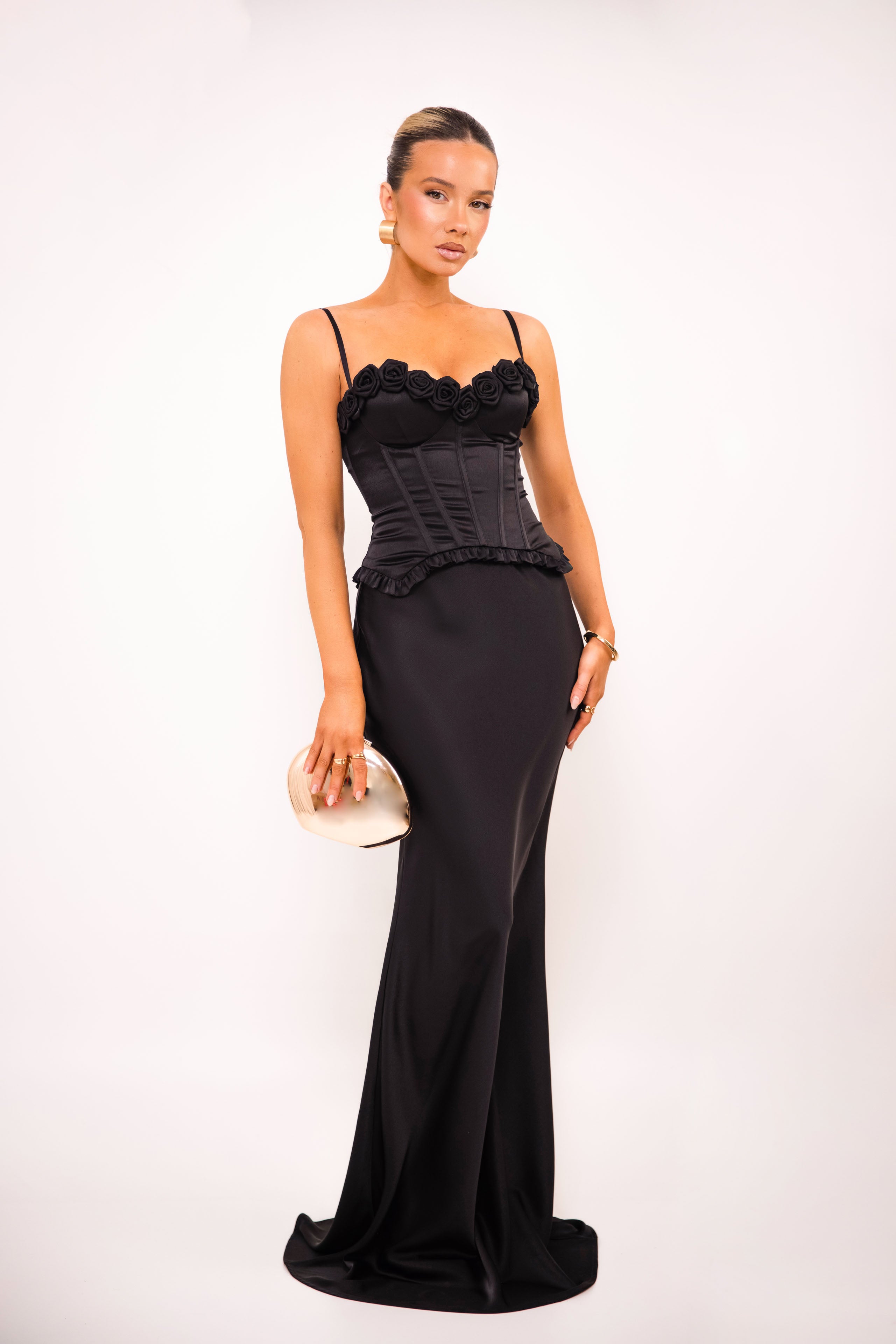 Fitted corset top with adjustable straps and structured silhouette