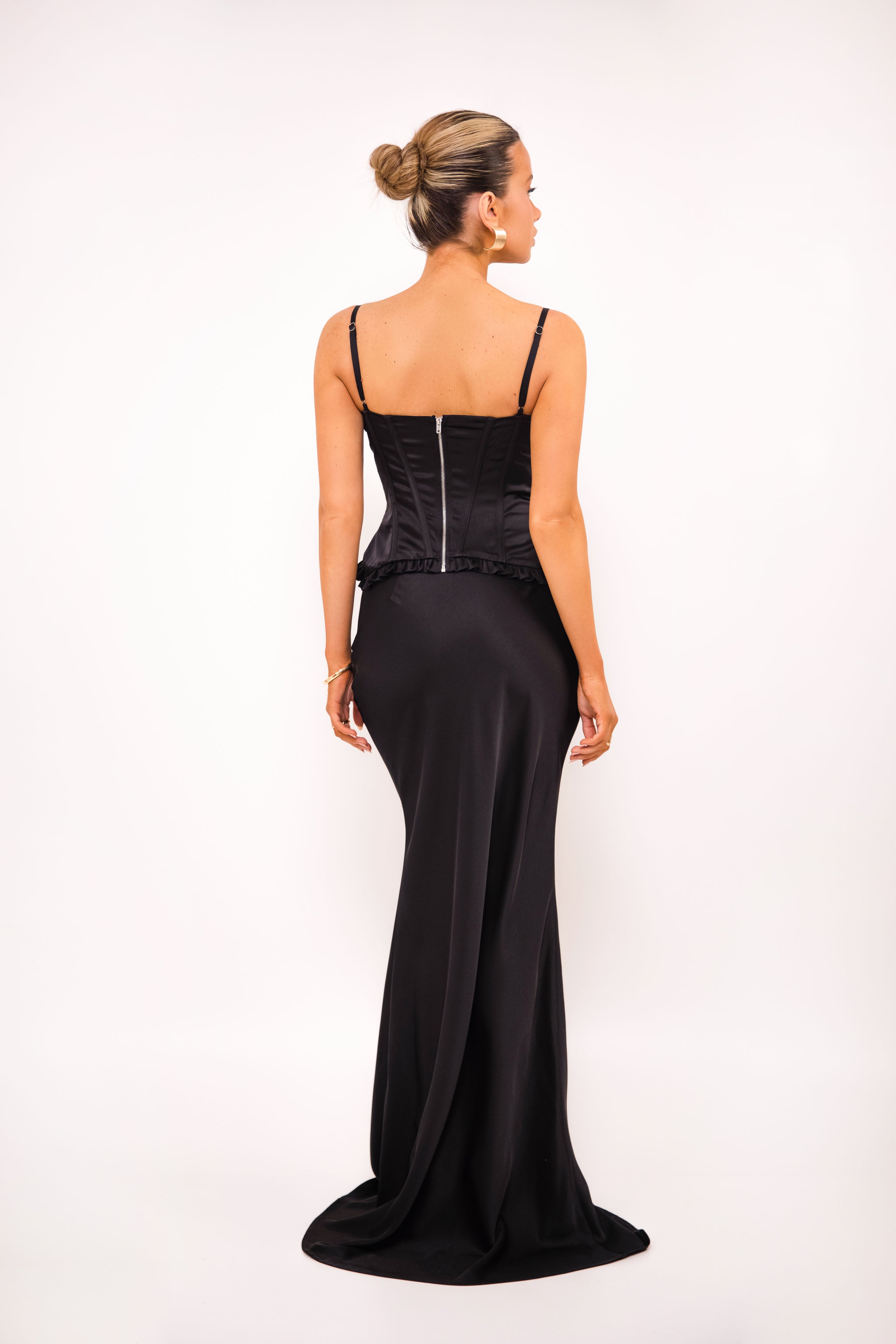 Romantic black bustier with sculpted cups and floral appliqué